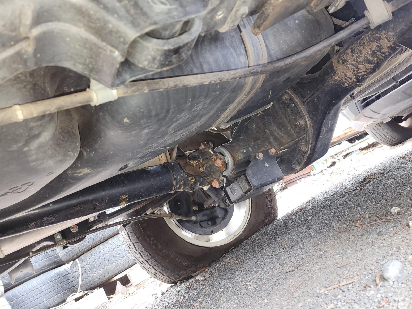 Undercarriage of a Vehicle Showing Rusted Suspension Parts — South West 4WD Wreckers In Harristown, QLD