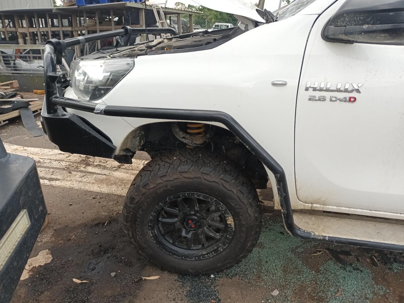Damaged White Pickup Truck with A Bent Front Bumper — South West 4WD Wreckers In Harristown, QLD