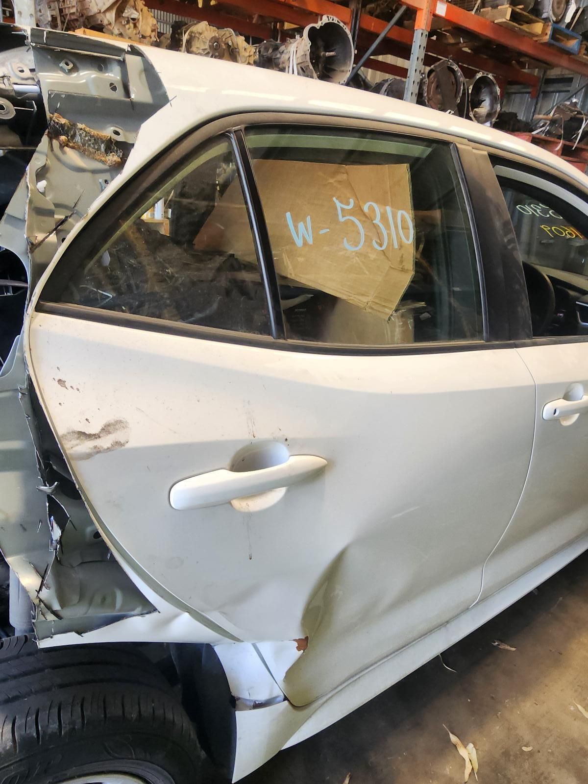 White Sedan With Heavy Side Damage — South West 4WD Wreckers In Harristown, QLD