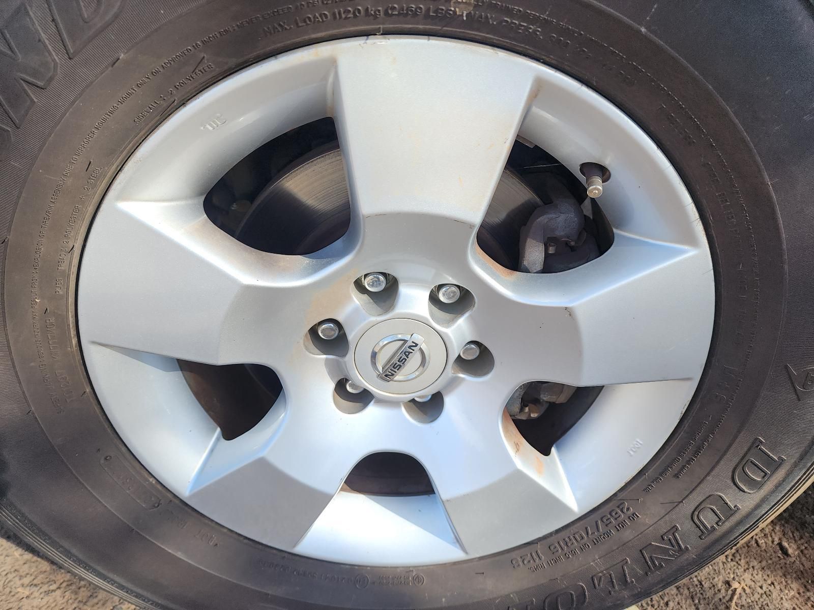 Close-up of a Silver Alloy Car Wheel — South West 4WD Wreckers In Harristown, QLD