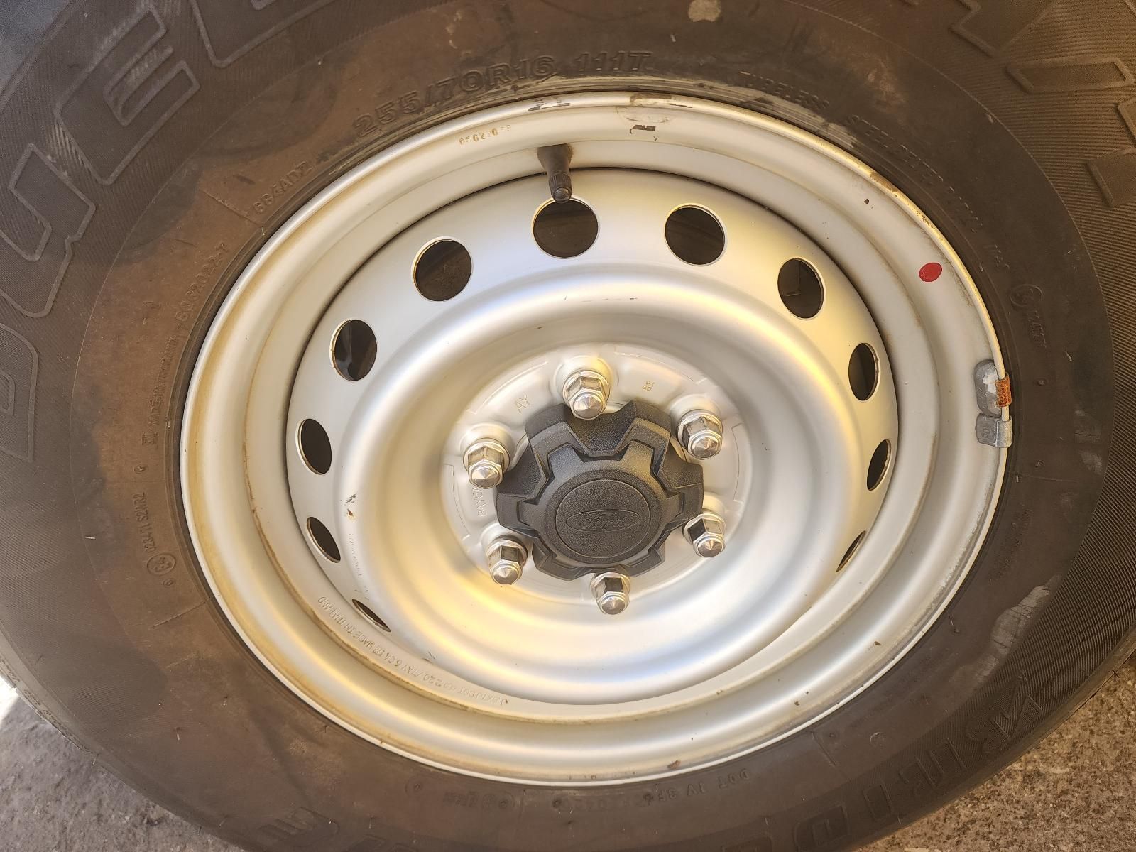 Close-up of a Car Wheel With a Steel Rim, Black Tyre — South West 4WD Wreckers In Harristown, QLD