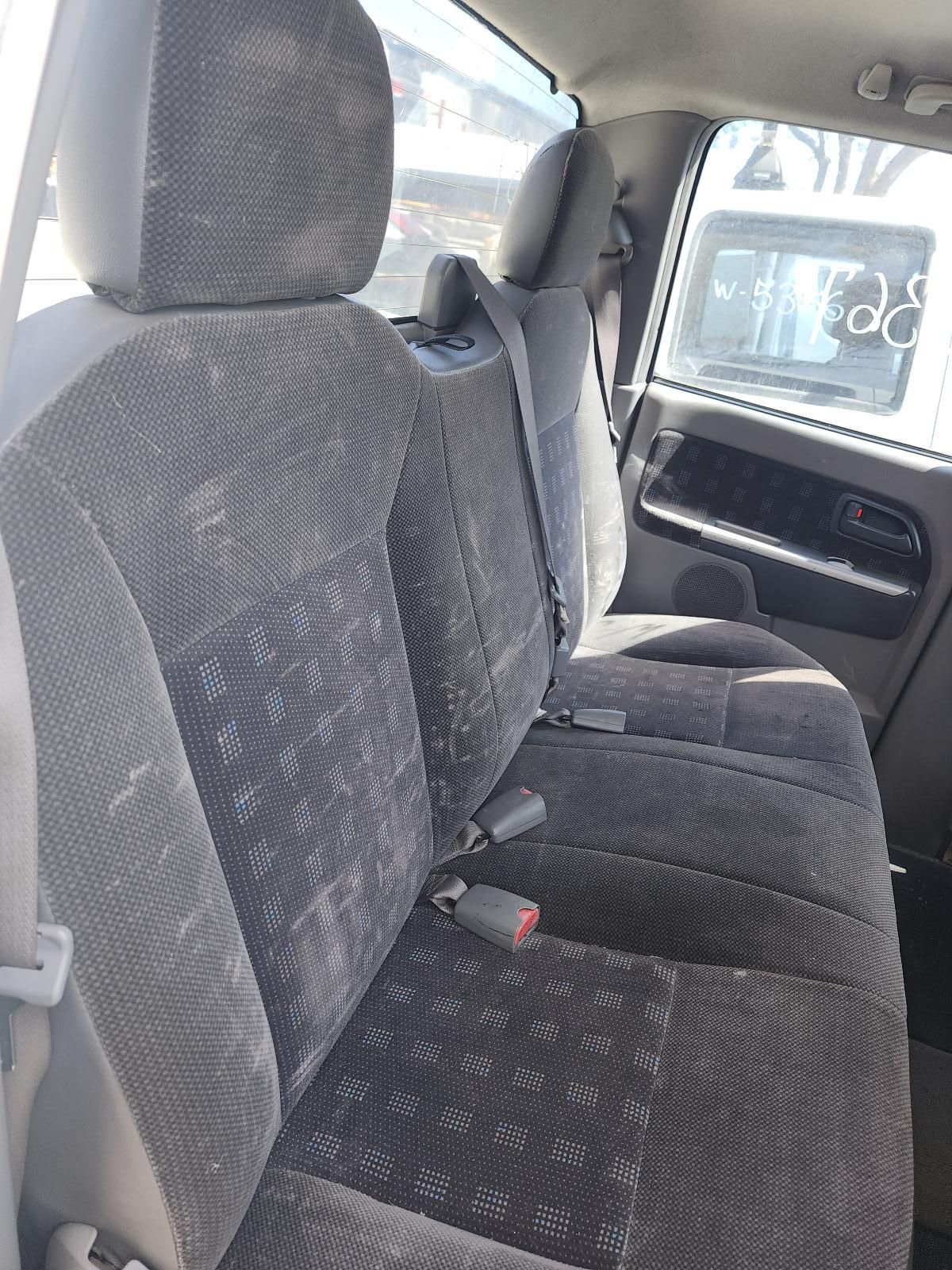 Car Back Seat With Gray Patterned Upholstery — South West 4WD Wreckers In Harristown, QLD