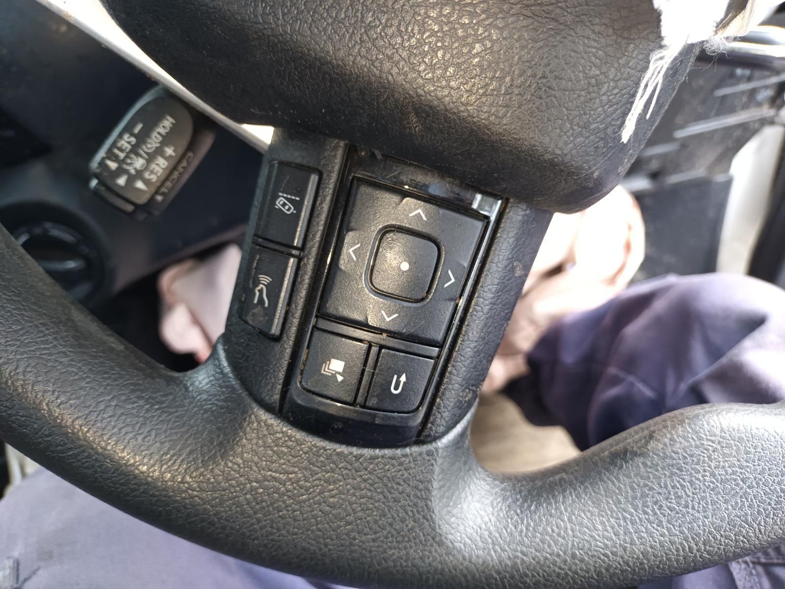 Close-Up of A Car Steering Wheel with Cruise Control Buttons — South West 4WD Wreckers In Harristown, QLD