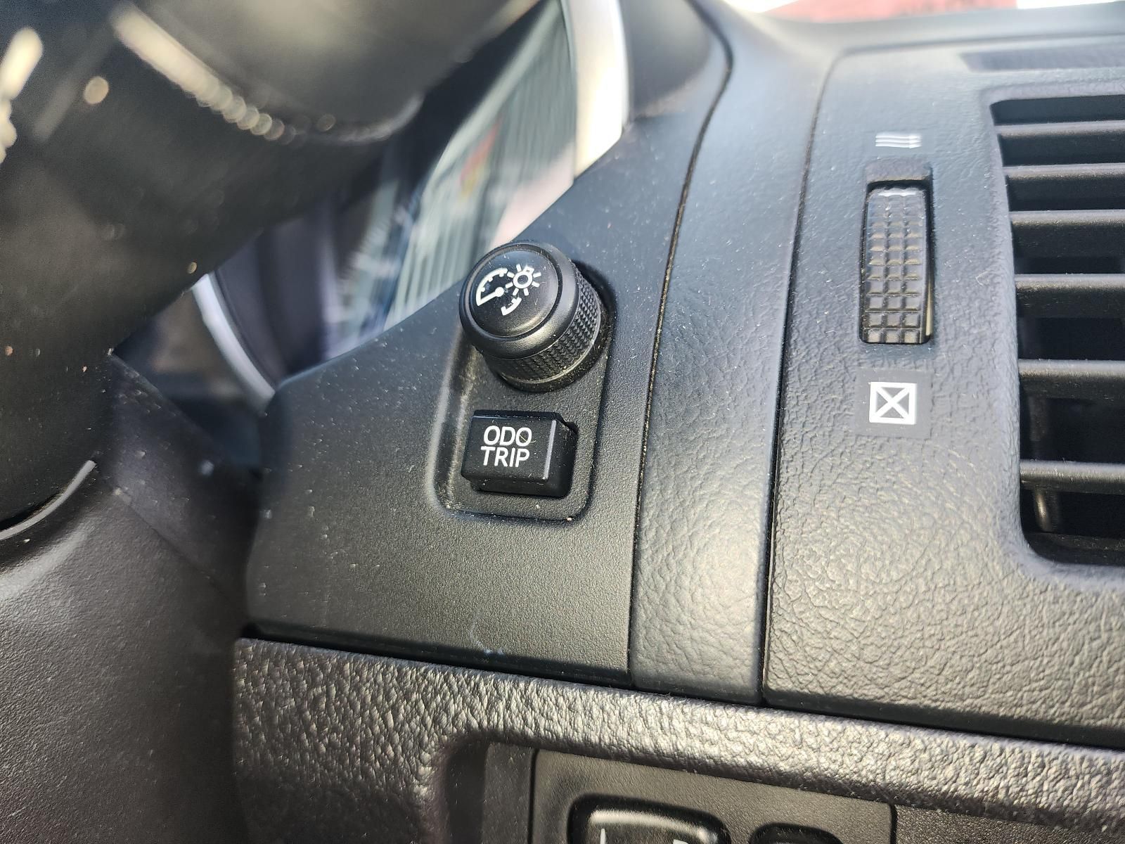 Car Dashboard Close-up Showing Cruise Control — South West 4WD Wreckers In Harristown, QLD