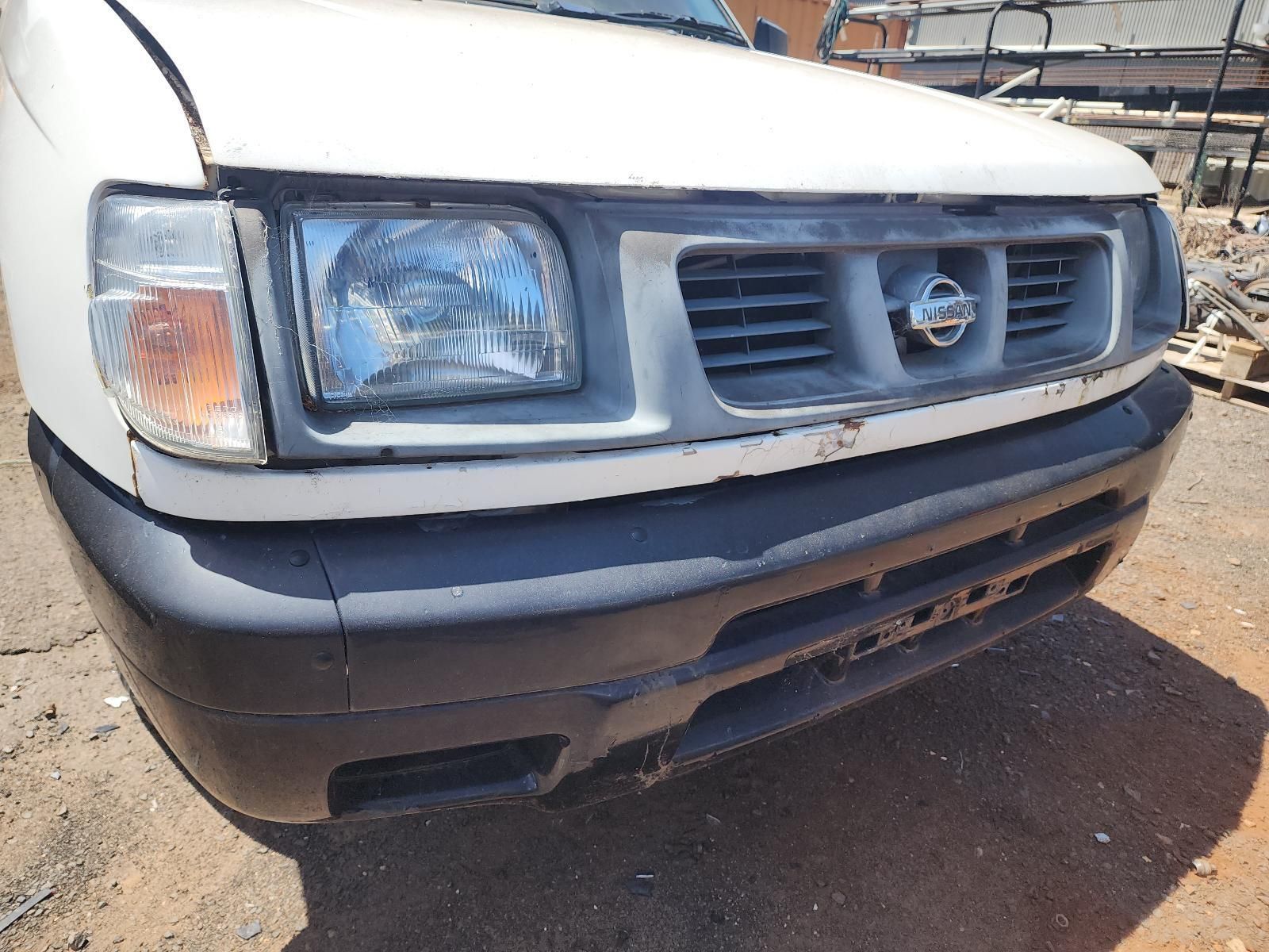 Front of a White Nissan Van — South West 4WD Wreckers In Harristown, QLD