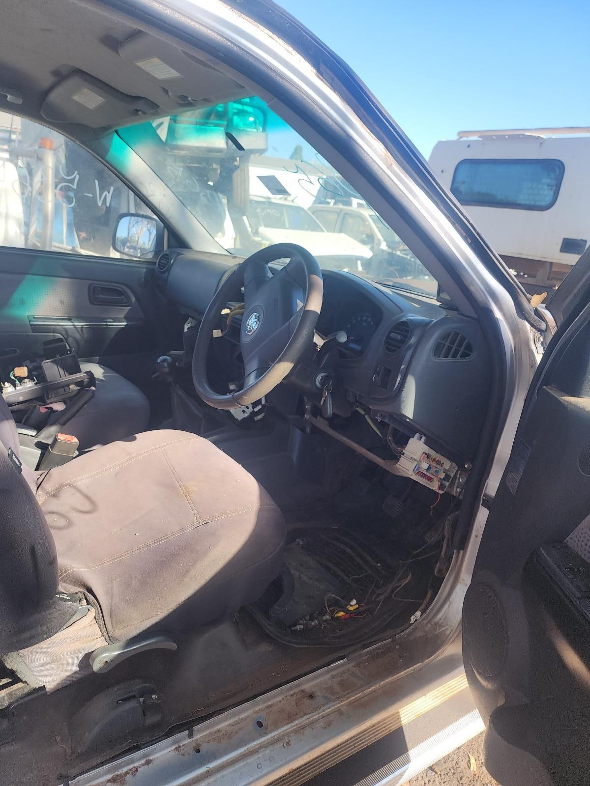 Damaged Car Interior with Open Door, Torn Seats — South West 4WD Wreckers In Harristown, QLD