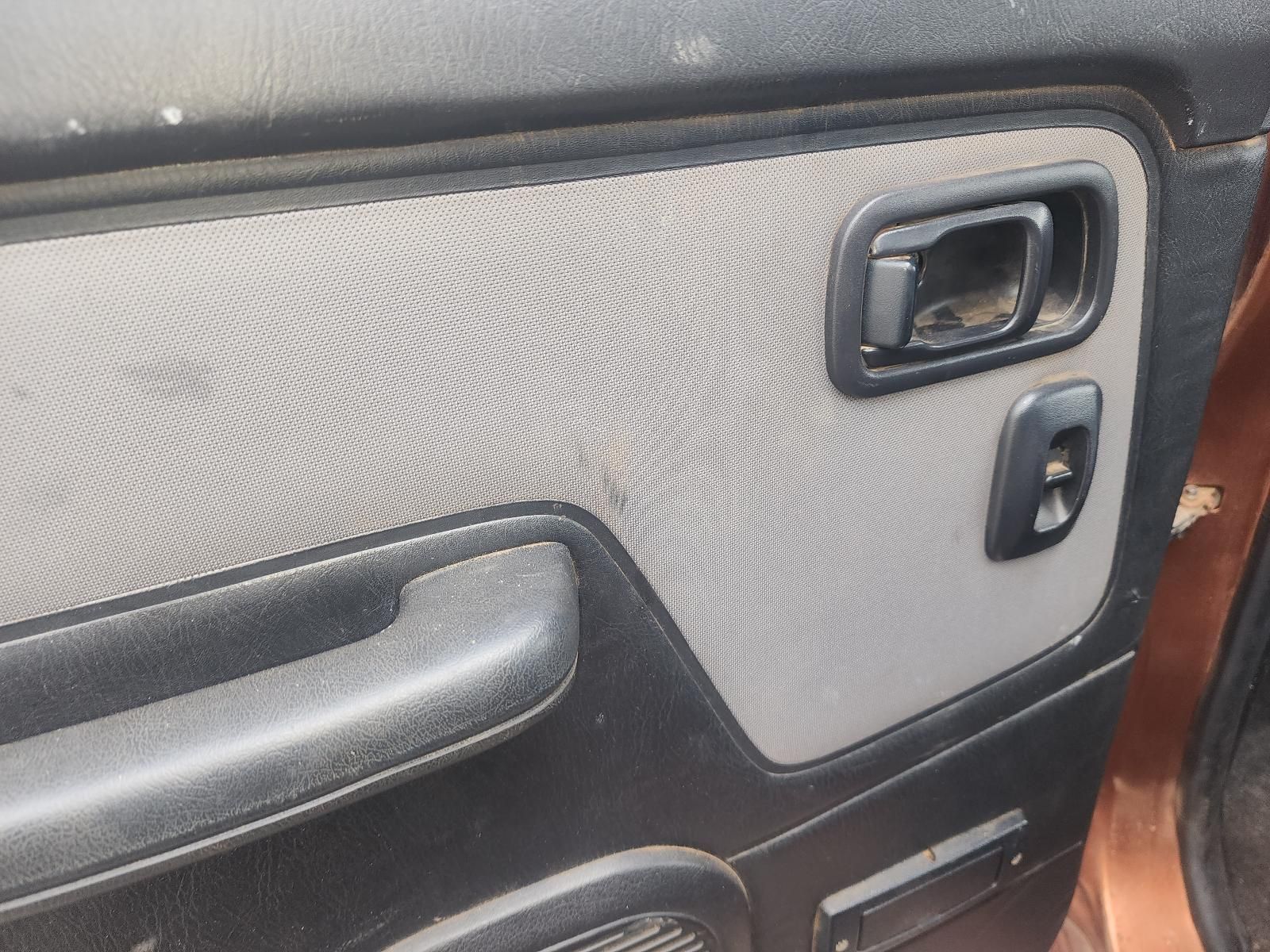Car Door Panel With Gray Fabric, Black Armrest — South West 4WD Wreckers In Harristown, QLD