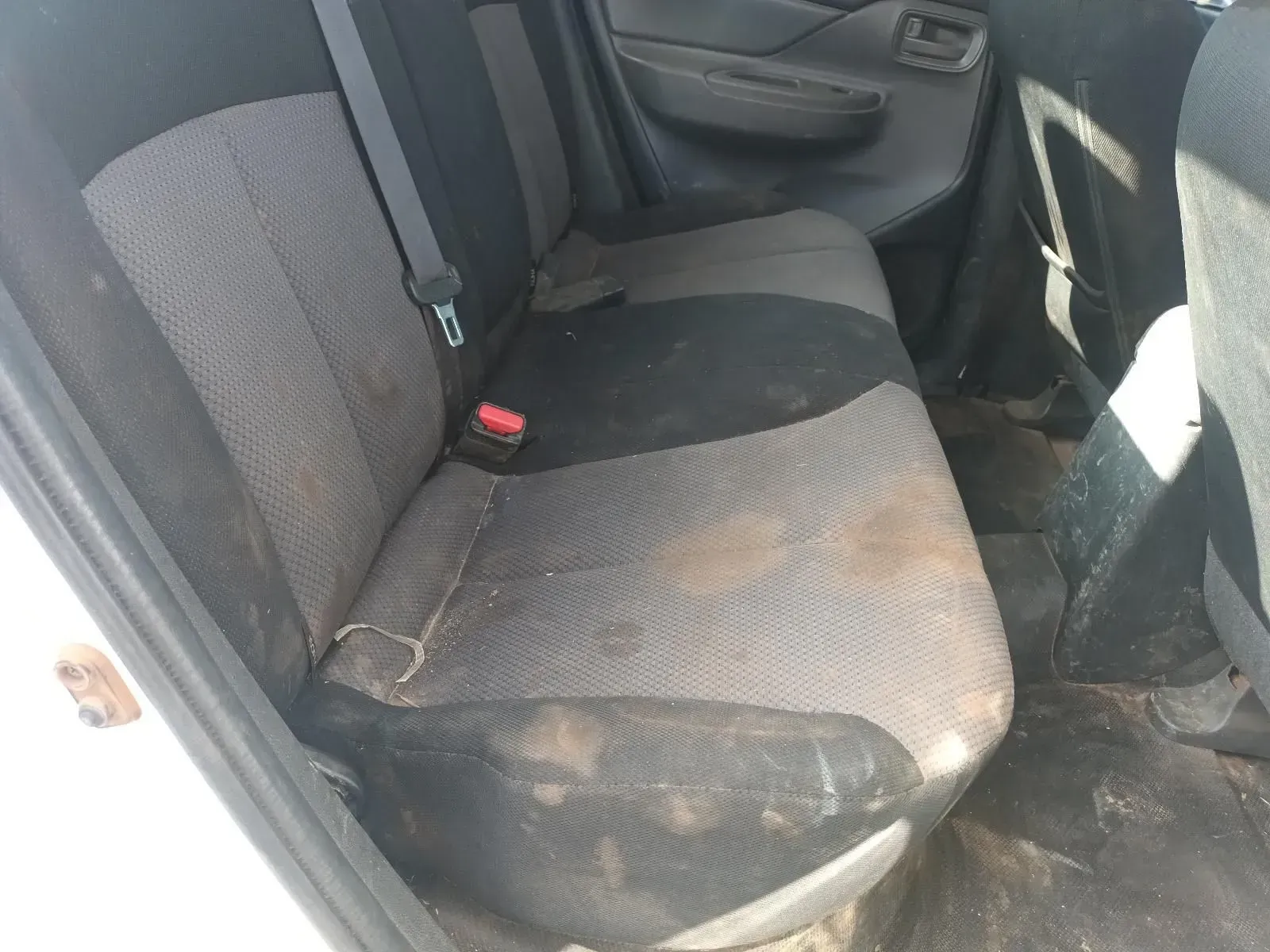 Dirty, Gray and Black Car Back Seat With Visible Dirt and Stains — South West 4WD Wreckers In Harristown, QLD