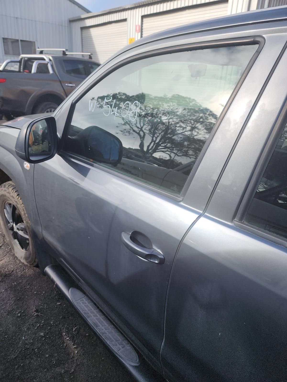 Gray SUV Parked in a Lot — South West 4WD Wreckers In Harristown, QLD
