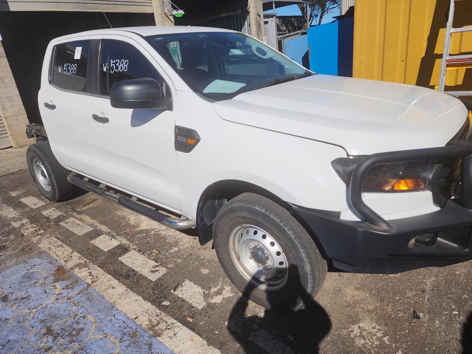 White Pickup Truck Parked on a Street — South West 4WD Wreckers In Harristown, QLD