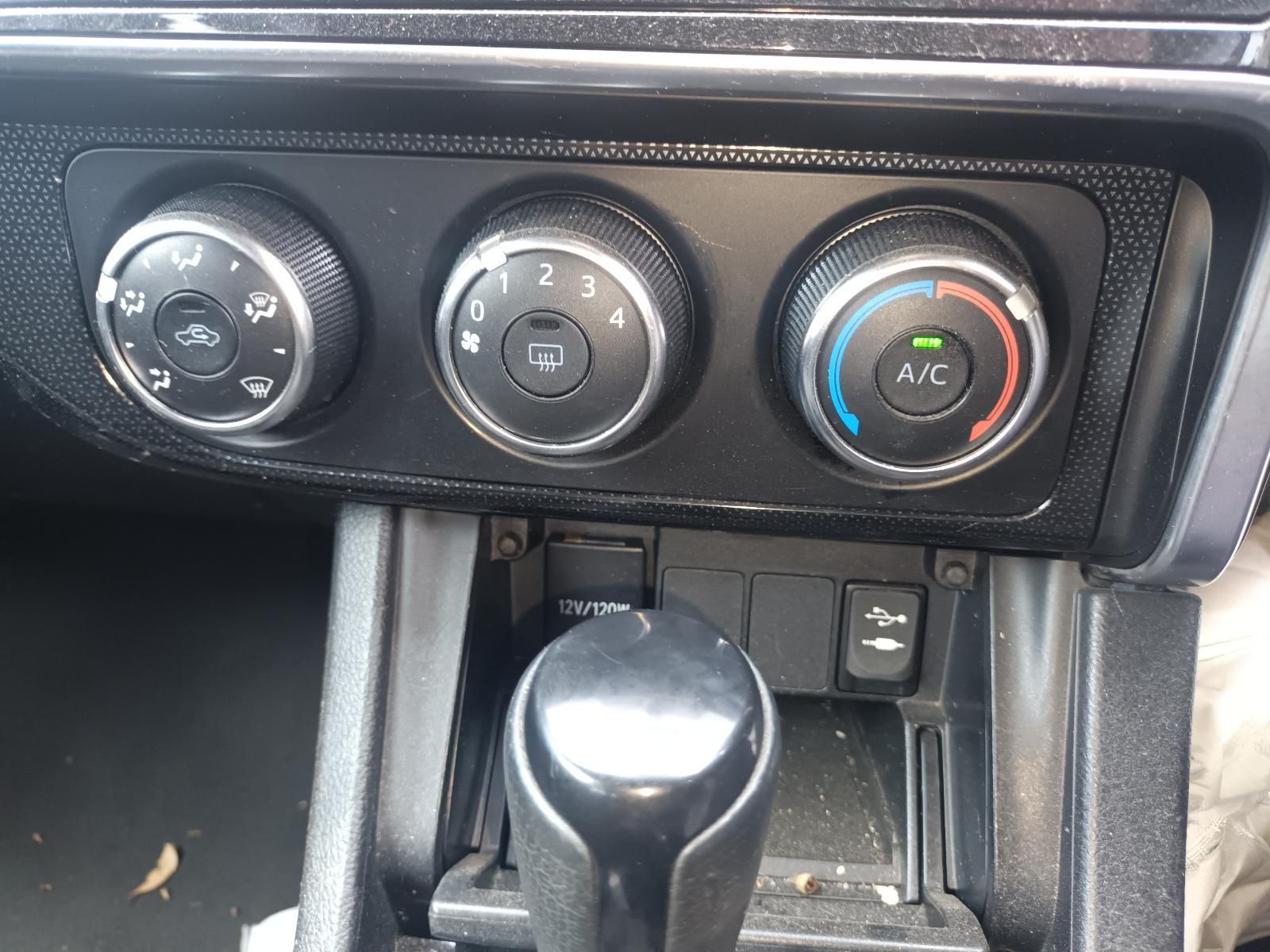 Car Dashboard Climate Controls Above a Gear Shifter — South West 4WD Wreckers In Harristown, QLD