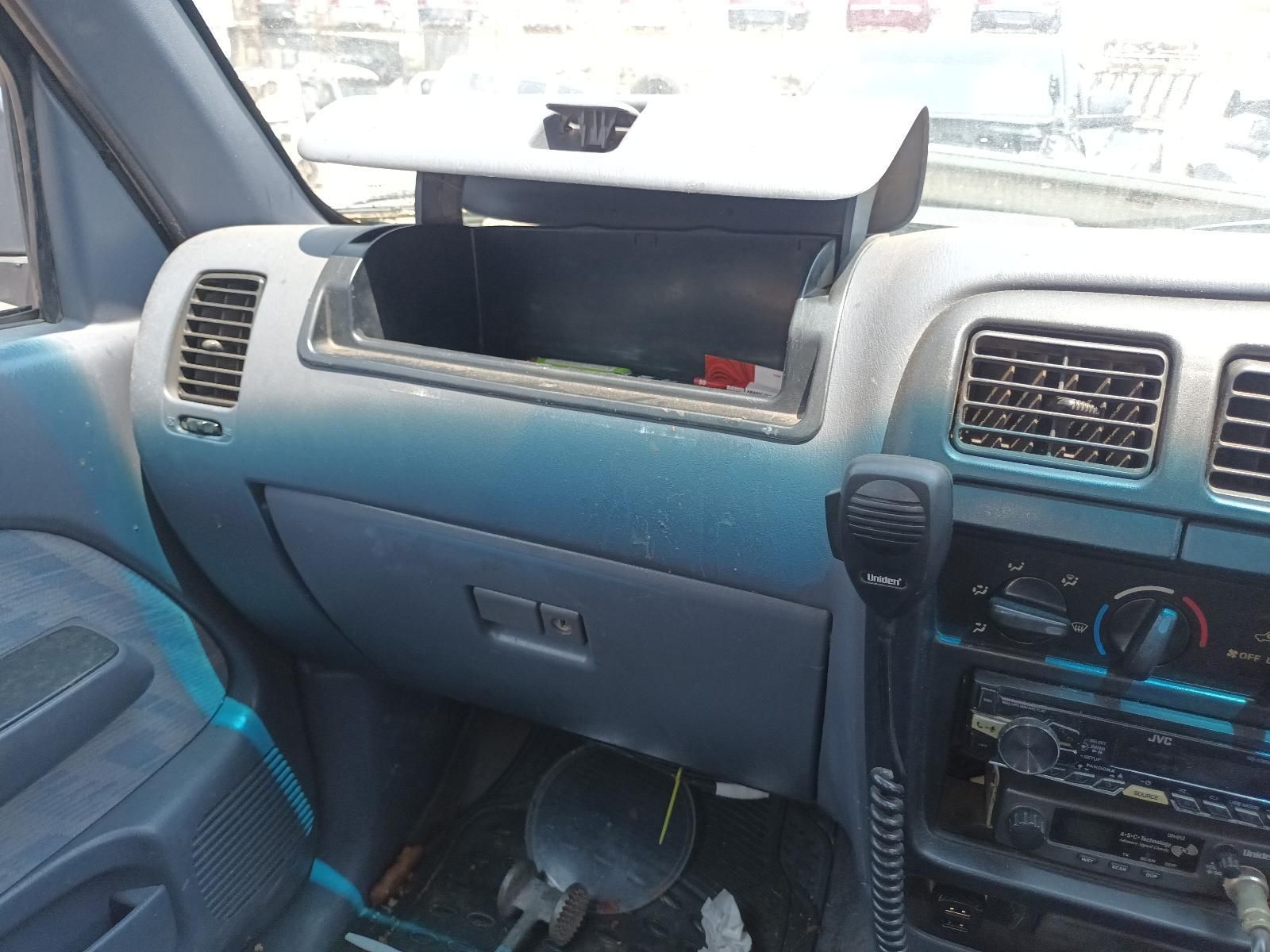 Car Interior with A Blue Dashboard and Open Glove Compartment — South West 4WD Wreckers In Harristown, QLD