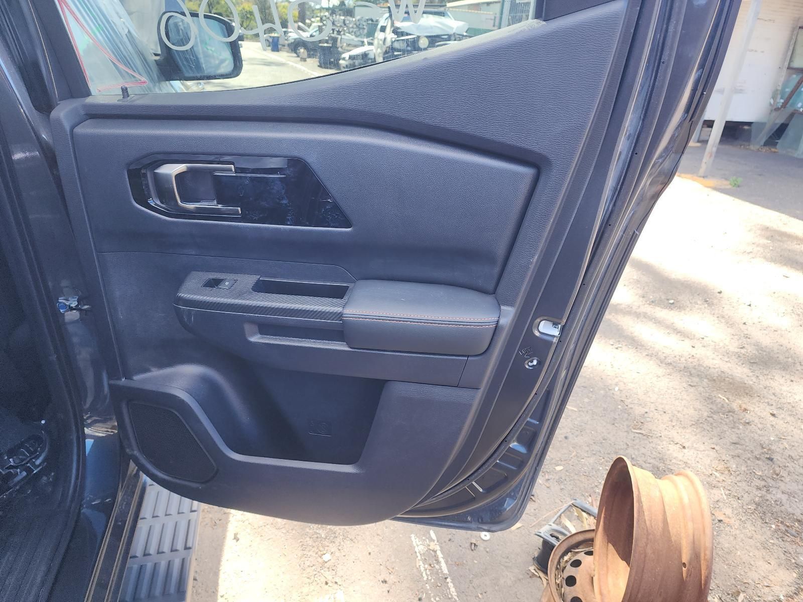 Open Car Door Interior With Dark Panel — South West 4WD Wreckers In Harristown, QLD