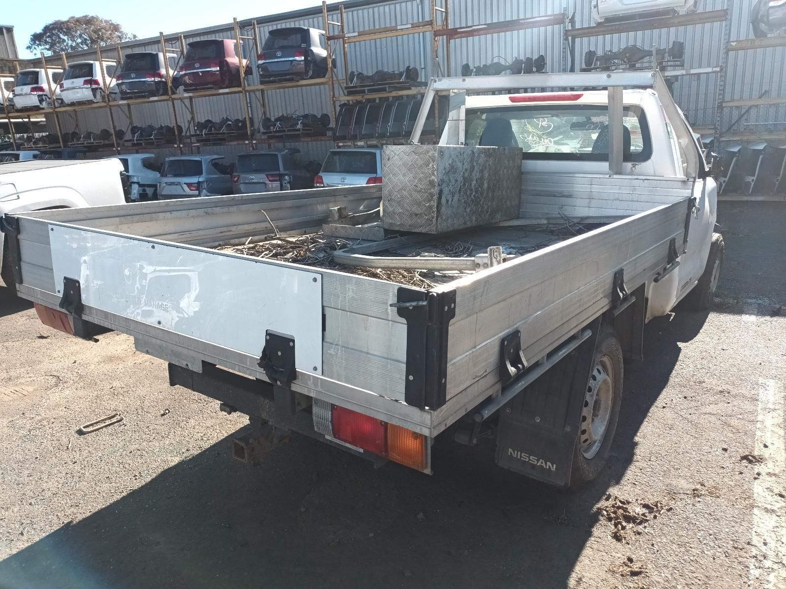 White Flatbed Pickup Truck in a Salvage Yard — South West 4WD Wreckers In Harristown, QLD