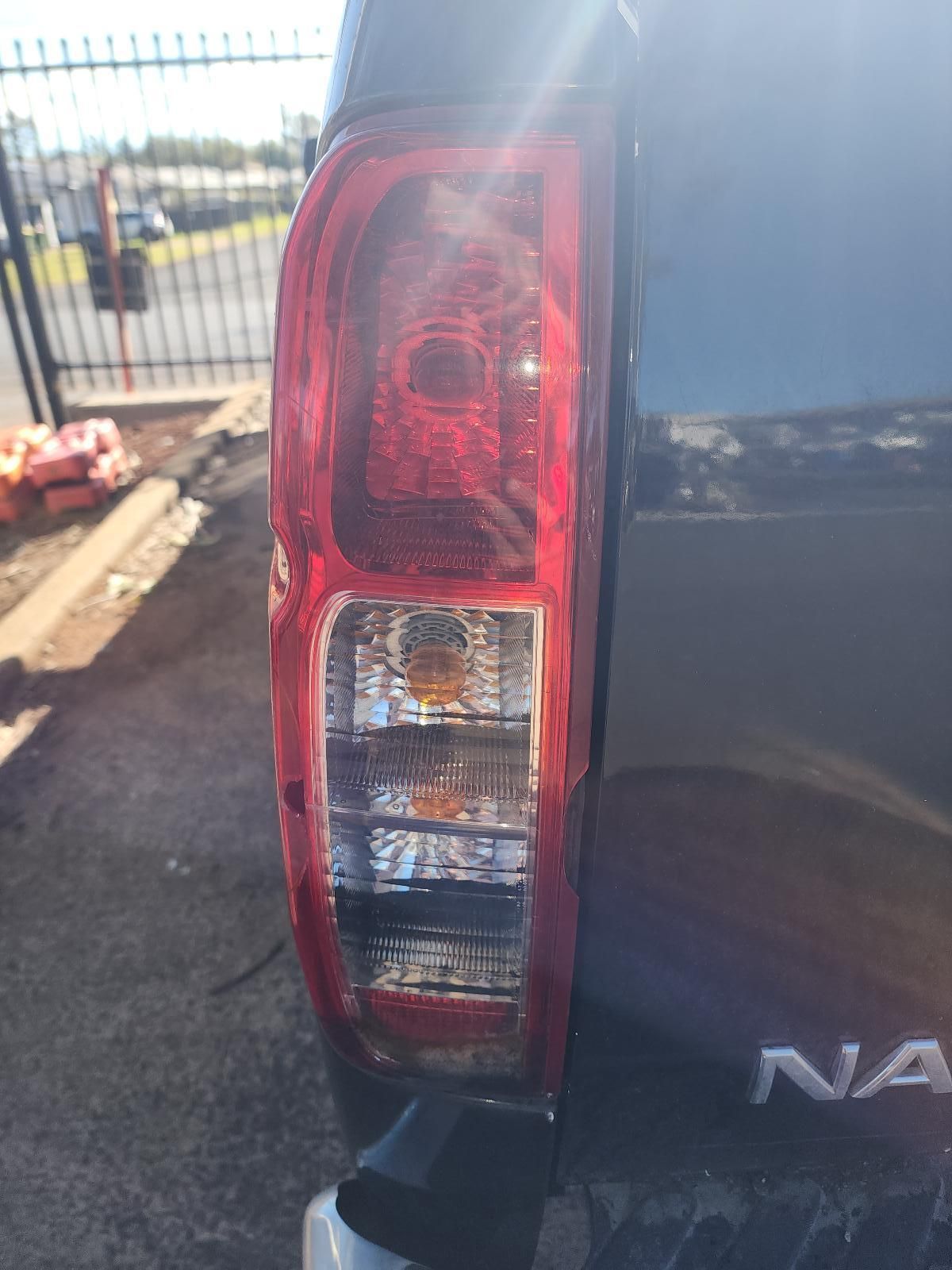 Close-up of a Blue Vehicle’s Rear Taillight — South West 4WD Wreckers In Harristown, QLD