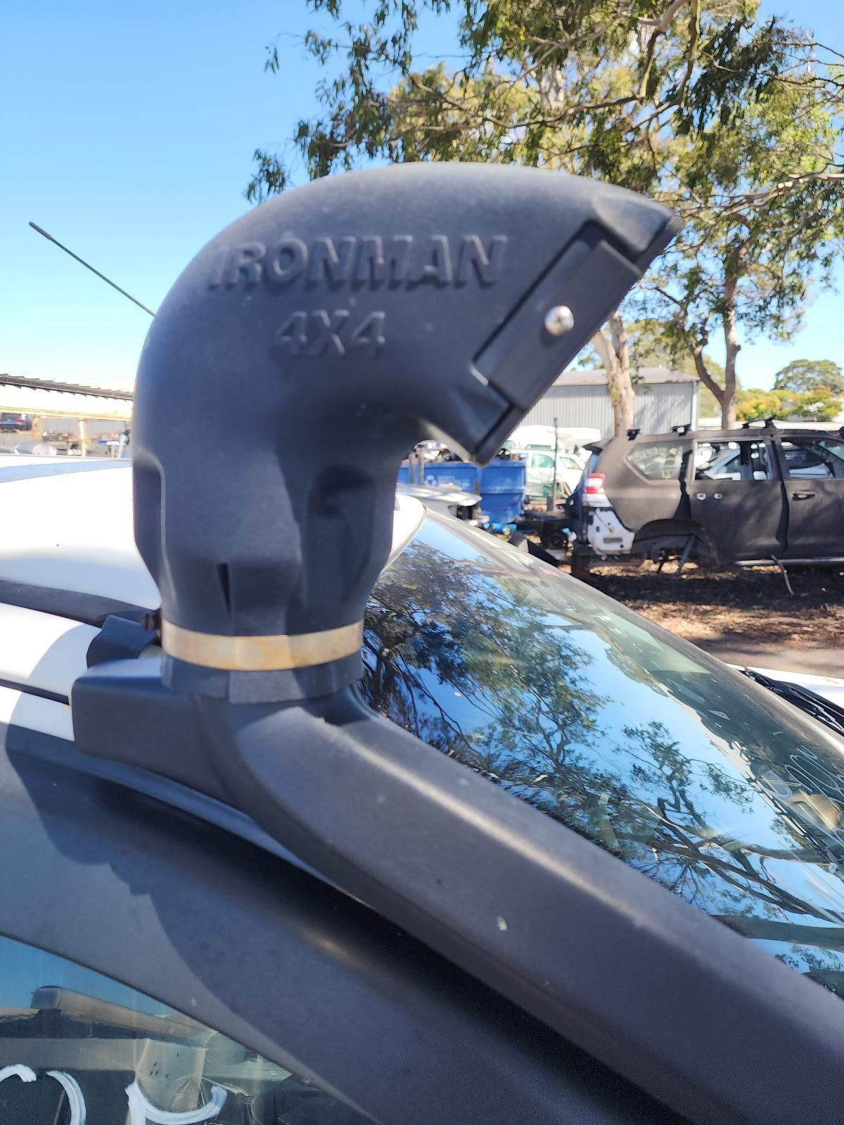 Black Snorkel on a White Vehicle Roof — South West 4WD Wreckers In Harristown, QLD