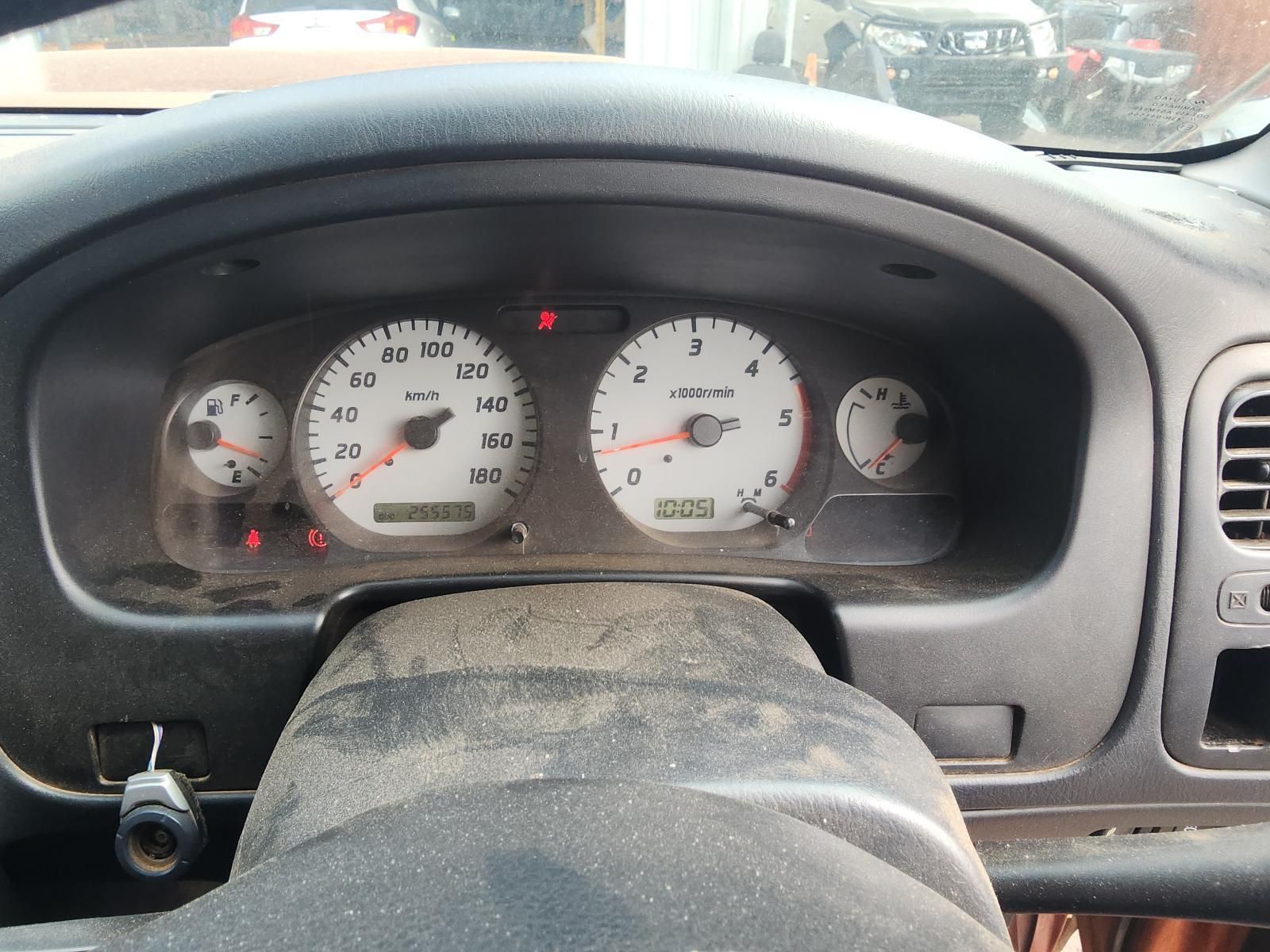 Car Dashboard With Analog Gauges and Warning Lights Illuminated — South West 4WD Wreckers In Harristown, QLD