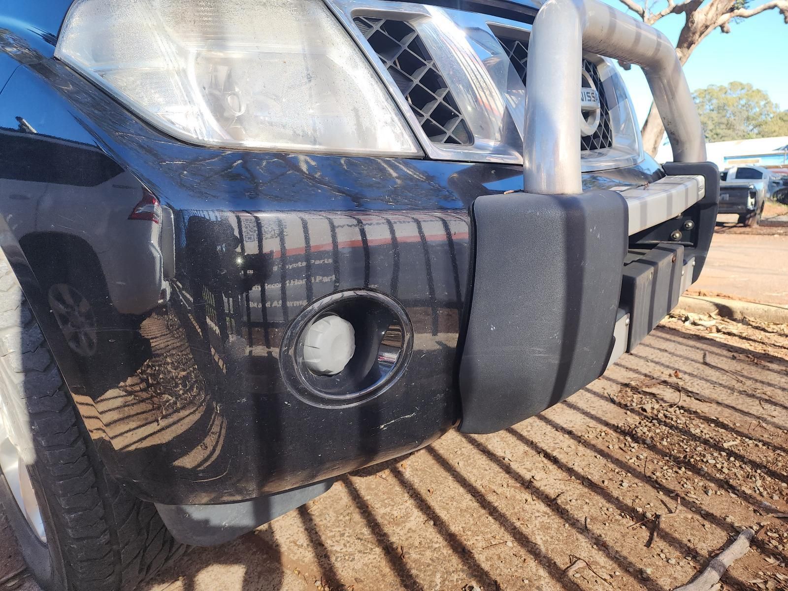 Front of a Black SUV With Bull Bar and Damaged Bumper — South West 4WD Wreckers In Harristown, QLD