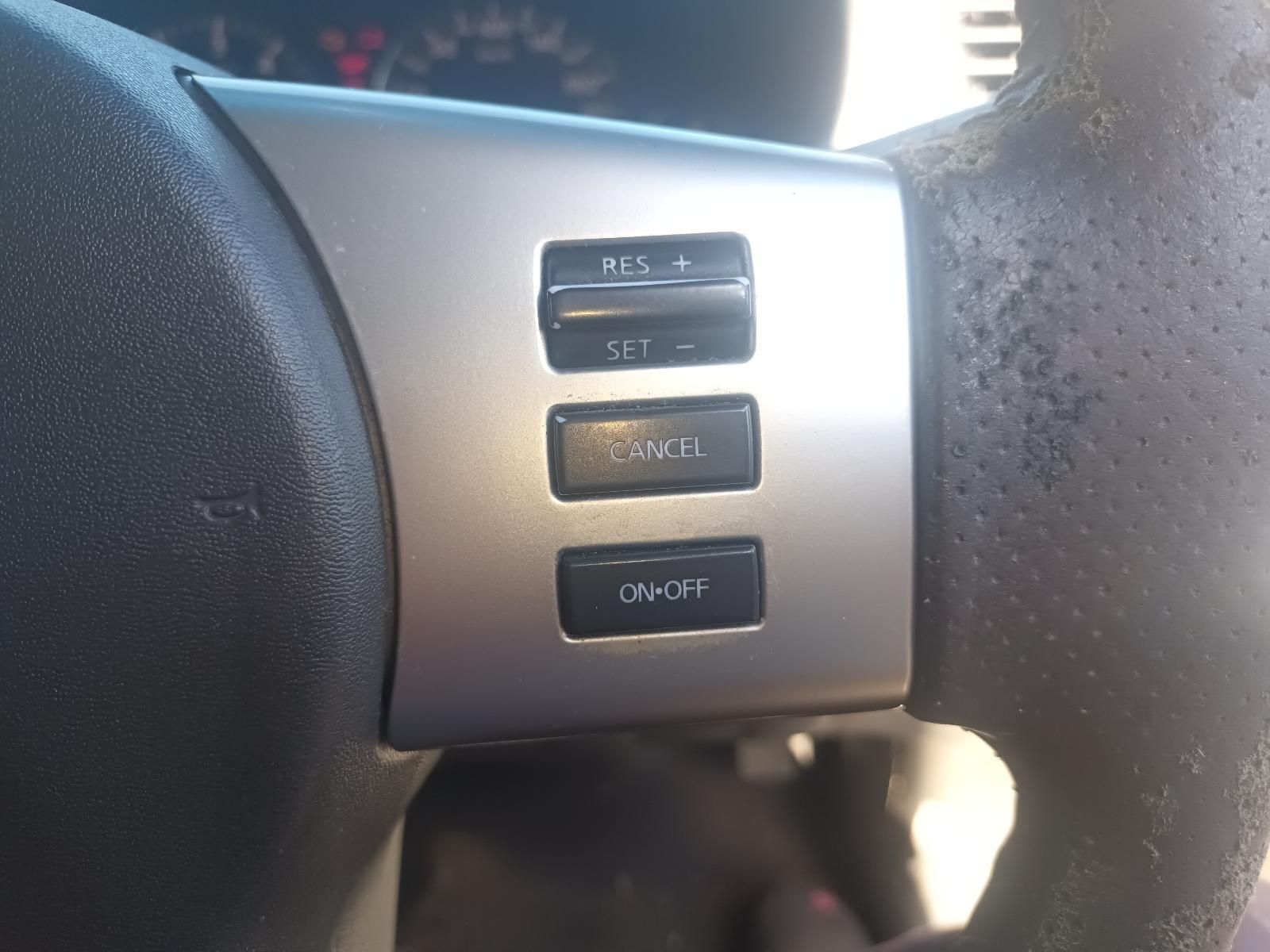 Close-Up of A Car Steering Wheel with Three Control Buttons — South West 4WD Wreckers In Harristown, QLD