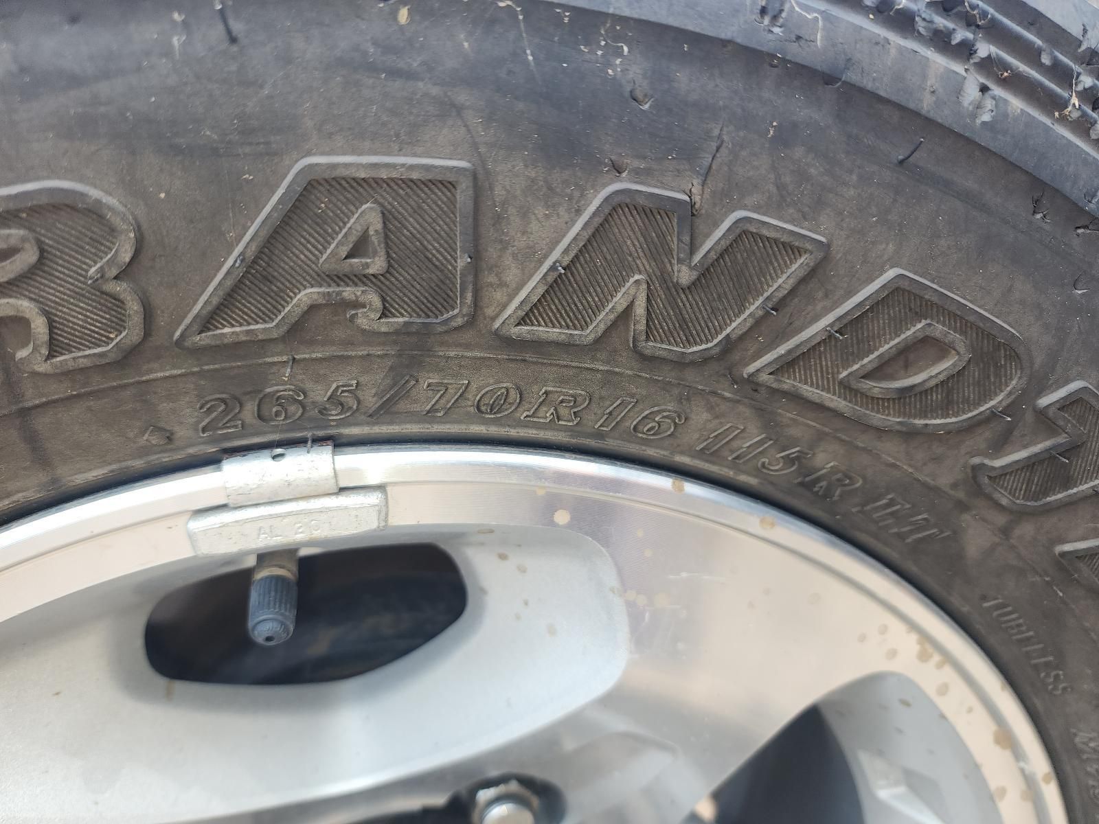 Close-up of a Car Tire and Silver Wheel Rim — South West 4WD Wreckers In Harristown, QLD