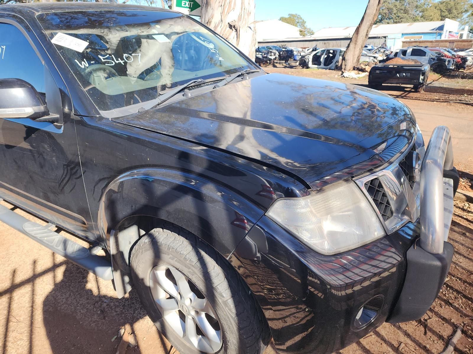 Black SUV With Front-end Damage Parked Outdoors — South West 4WD Wreckers In Harristown, QLD