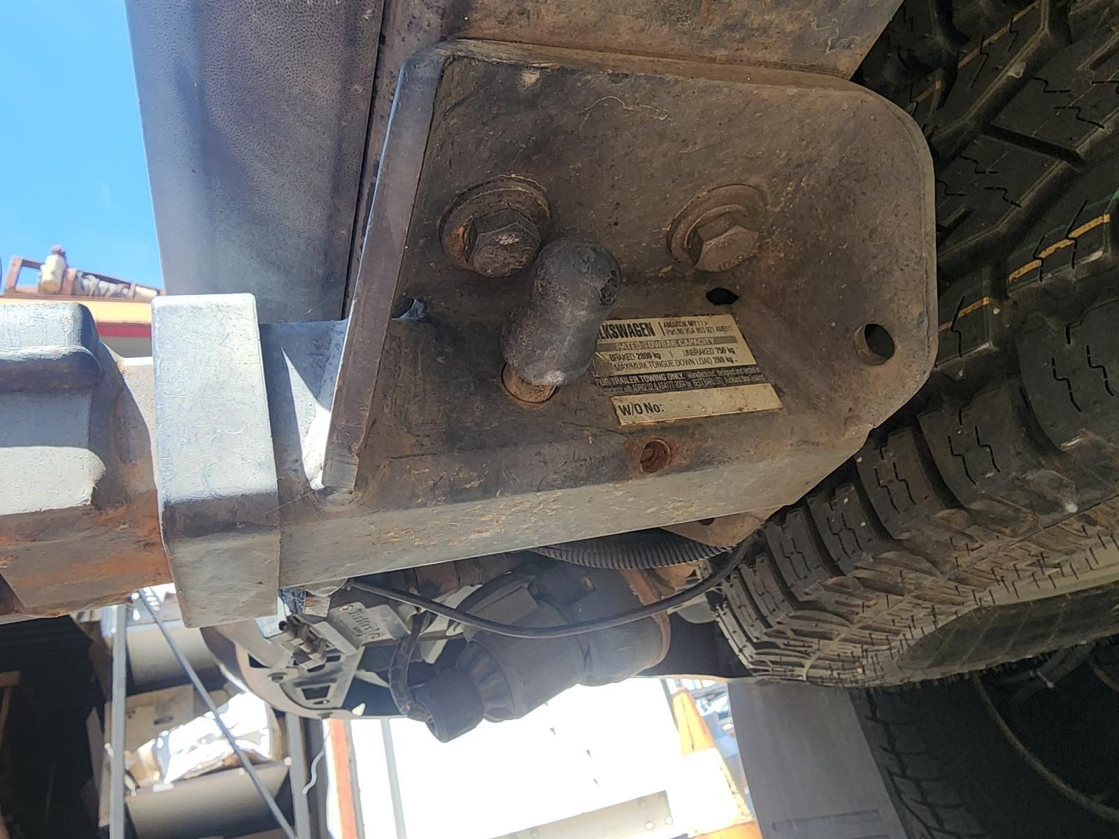 Underside of a Vehicle Showing a Rusty Metal Hitch — South West 4WD Wreckers In Harristown, QLD