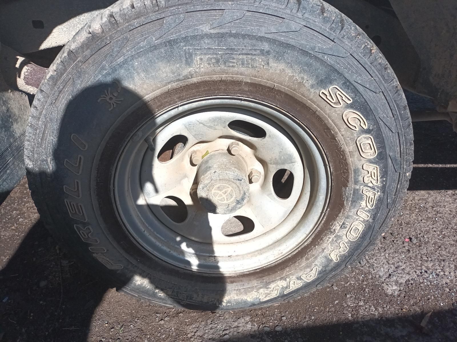 Flat Tyre on A Vehicle Wheel with A Damaged Rubber Sidewall — South West 4WD Wreckers In Harristown, QLD