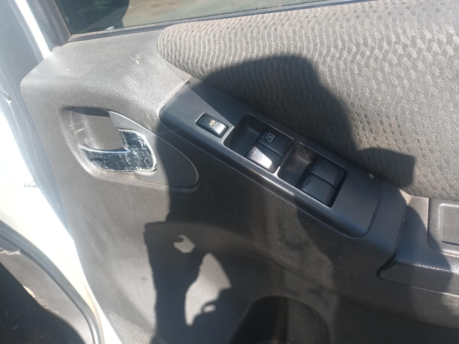 Car Door Interior with Gray Fabric Panel and Black Power Window — South West 4WD Wreckers In Harristown, QLD