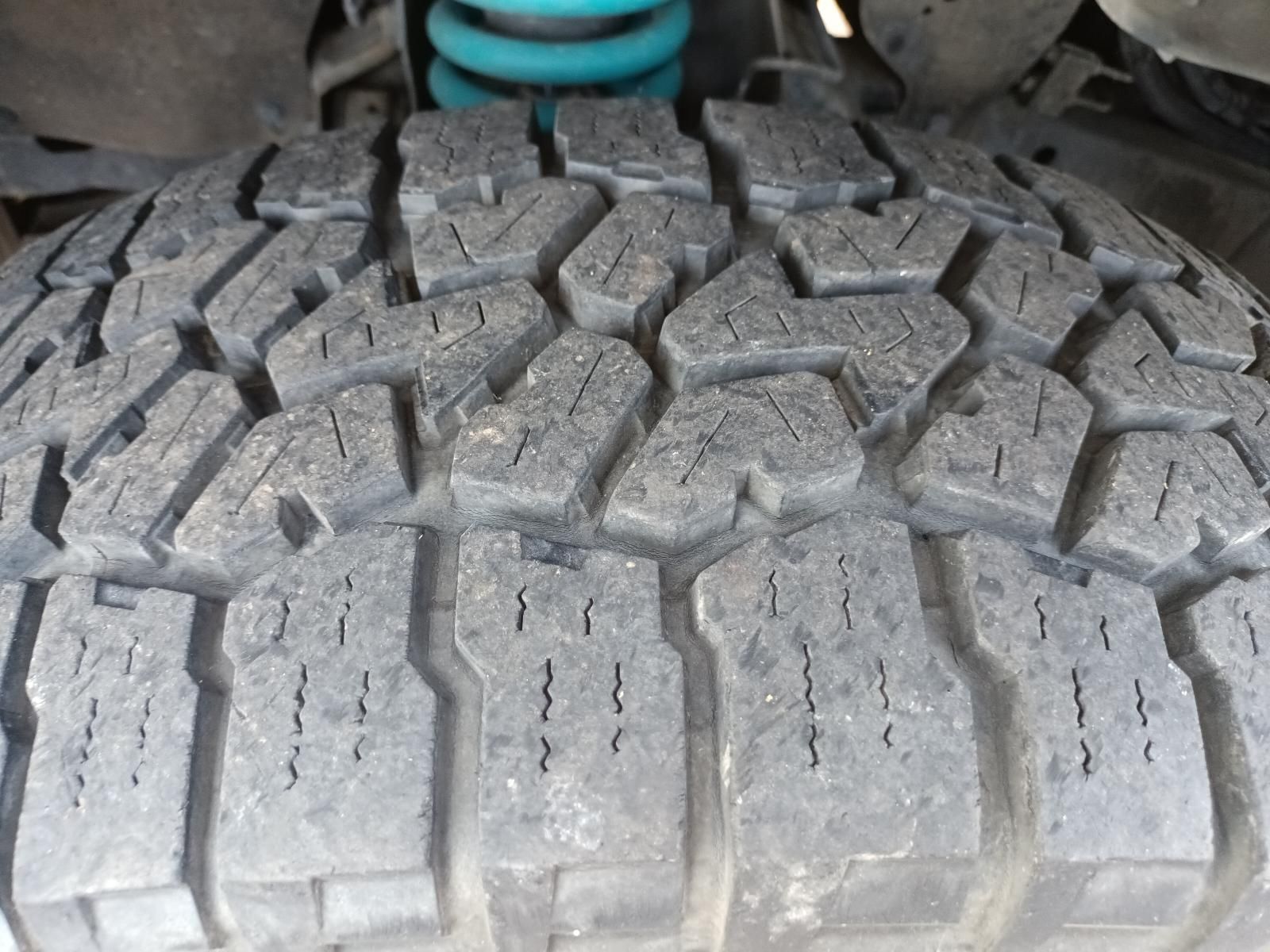 Close-Up of An Off-Road Tyre Tread Under a Vehicle Suspension — South West 4WD Wreckers In Harristown, QLD