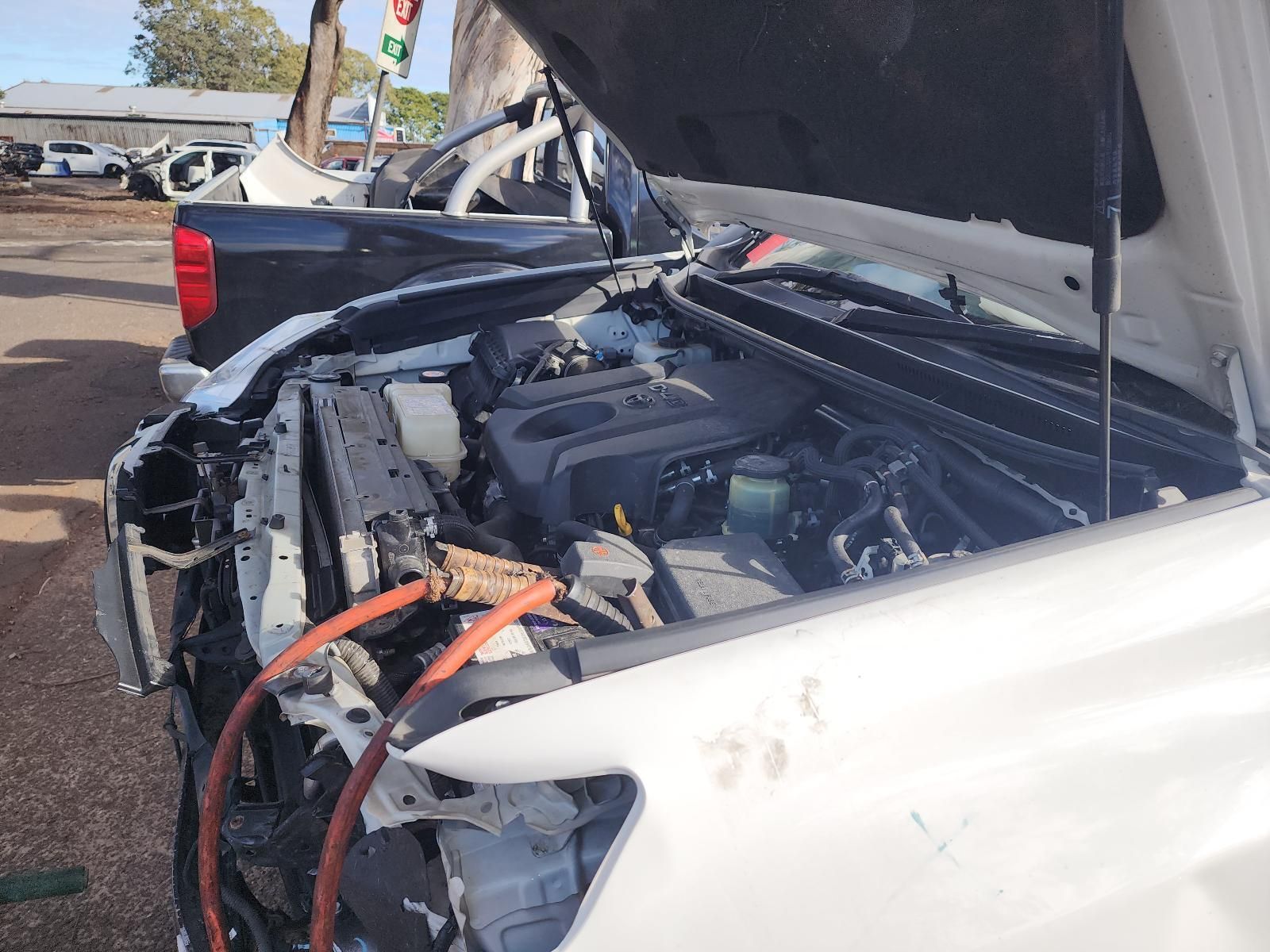 Damaged White SUV With Open Hood — South West 4WD Wreckers In Harristown, QLD