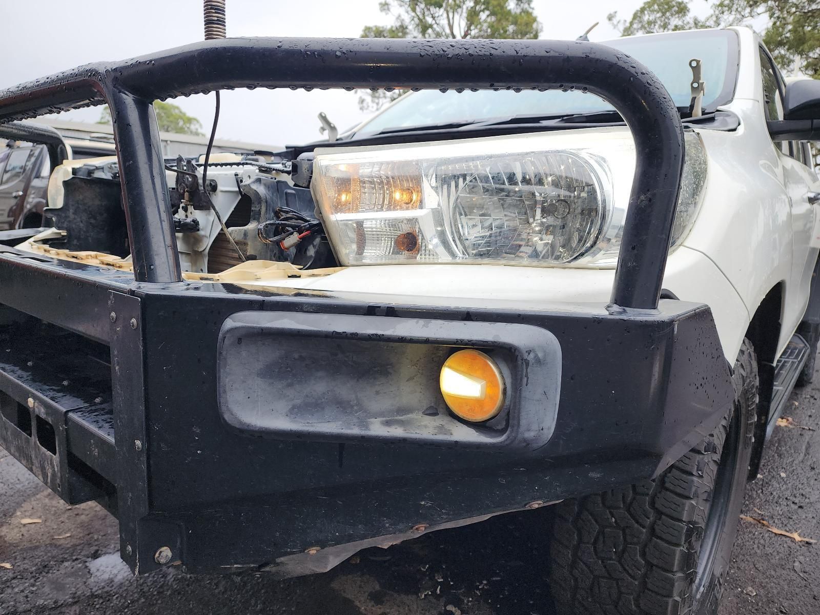 White Pickup Truck With a Black Bull Bar — South West 4WD Wreckers In Harristown, QLD