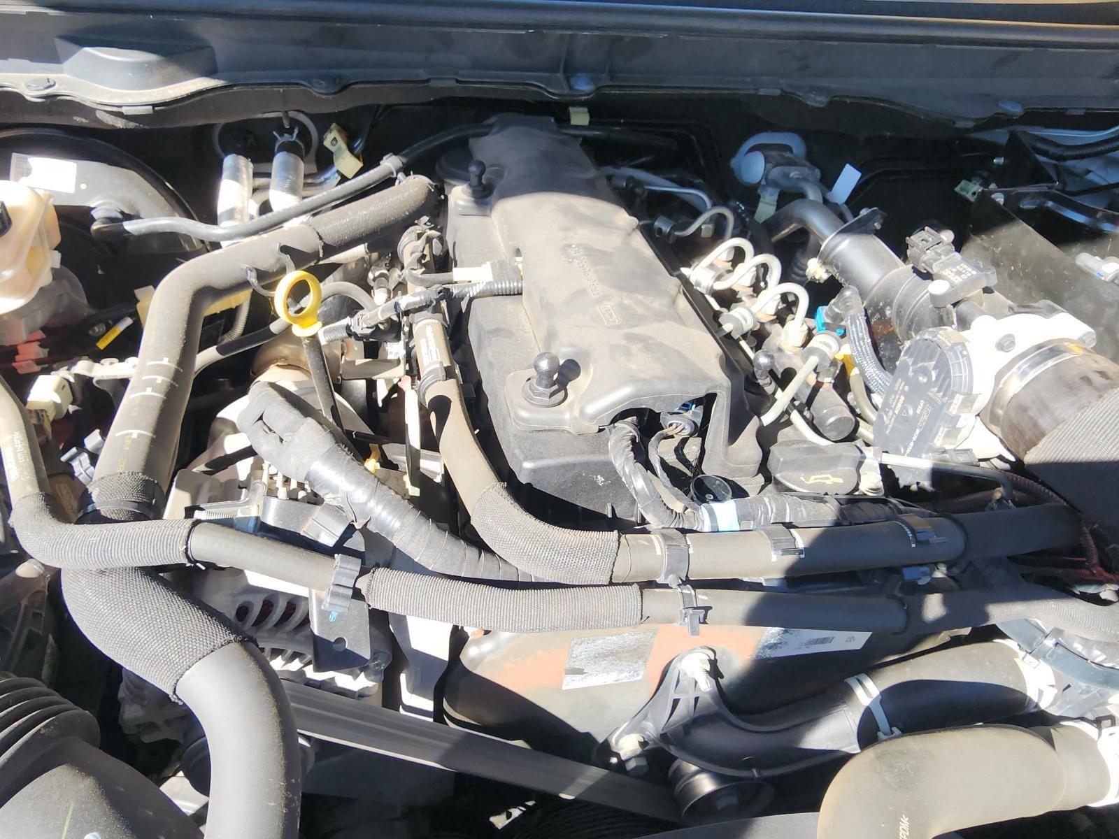 Car Engine Bay With Hood Open, Showing Hoses — South West 4WD Wreckers In Harristown, QLD