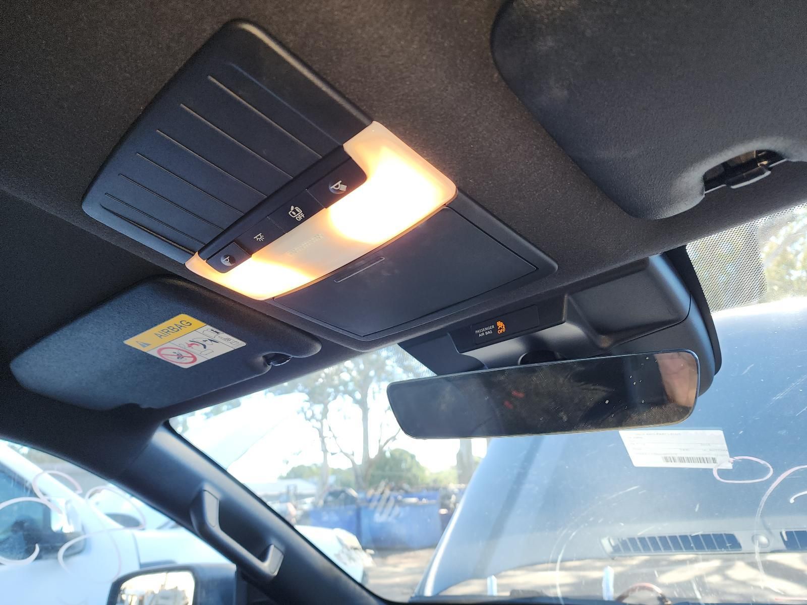 Car Interior Showing the Overhead Console Light on — South West 4WD Wreckers In Harristown, QLD