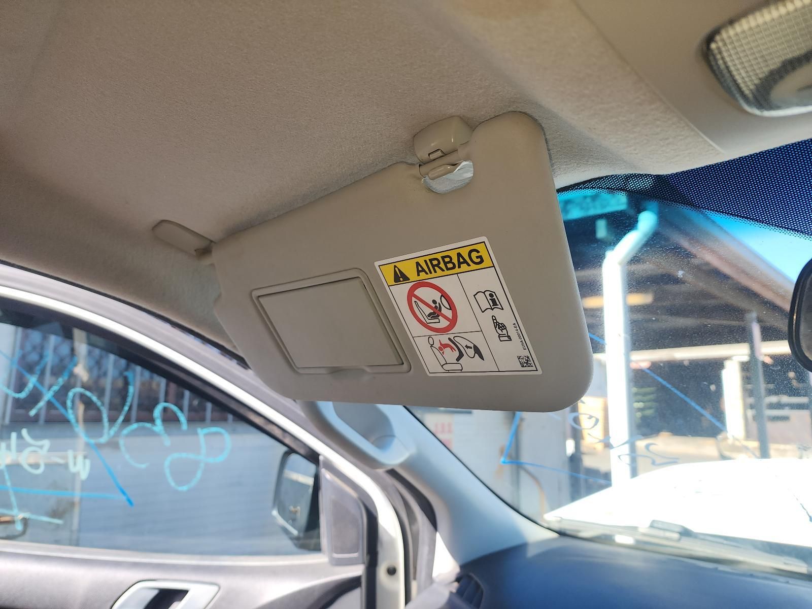Car Interior With Sun Visor Down — South West 4WD Wreckers In Harristown, QLD