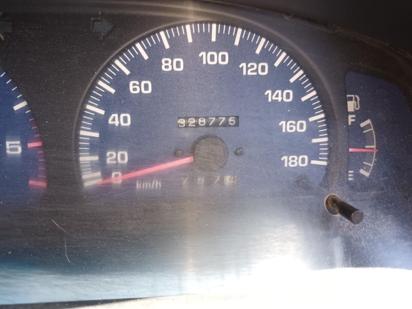 Car Dashboard Speedometer at 0 Mph, with Fuel and Temperature Gauges Visible — South West 4WD Wreckers In Harristown, QLD