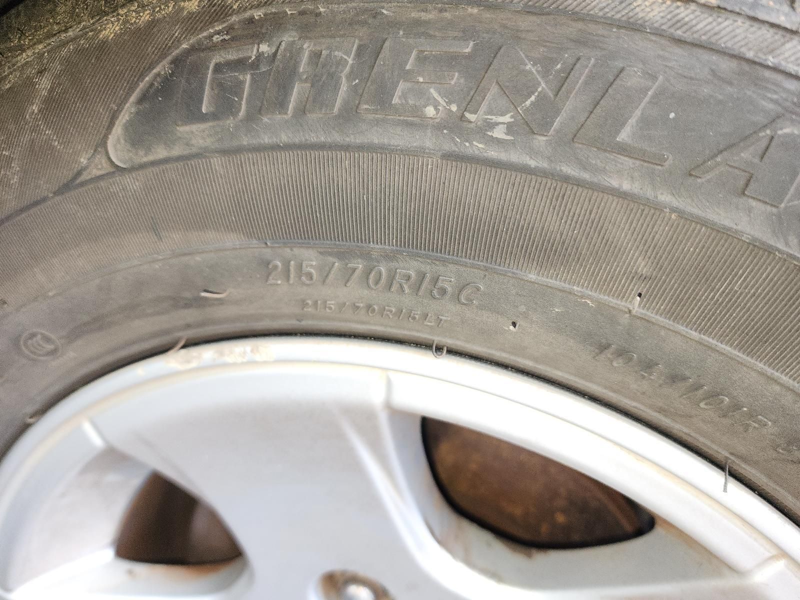 Close-up of a Car Tire and Silver Wheel Rim — South West 4WD Wreckers In Harristown, QLD