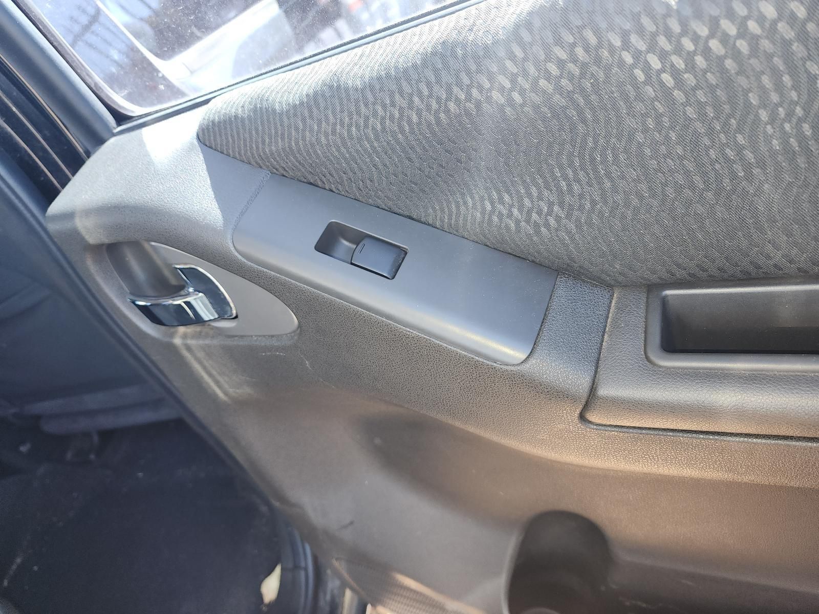 Car Door Interior With Gray Upholstery — South West 4WD Wreckers In Harristown, QLD
