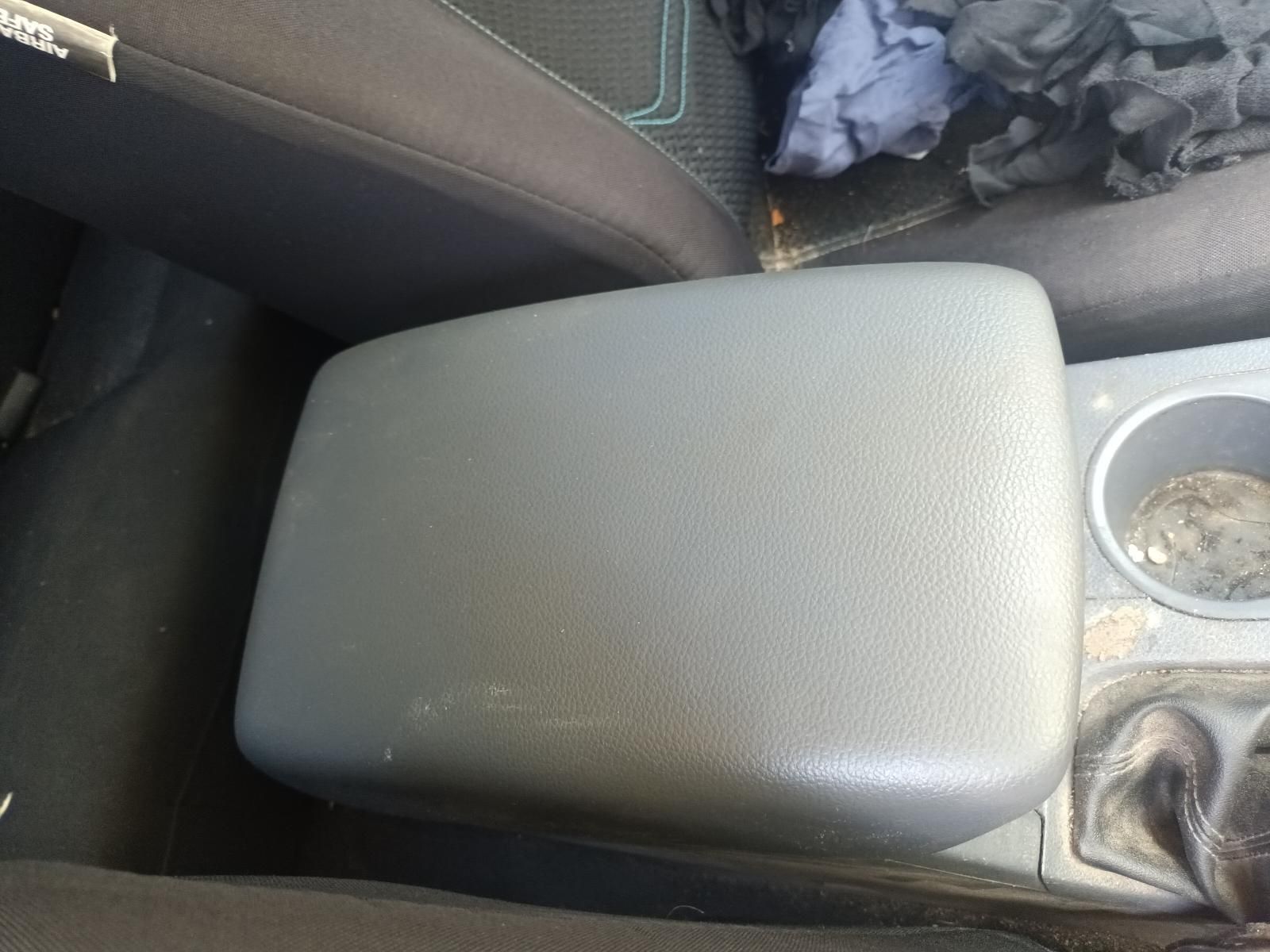 Gray Car Armrest Between the Center Seat and Cup Holder — South West 4WD Wreckers In Harristown, QLD