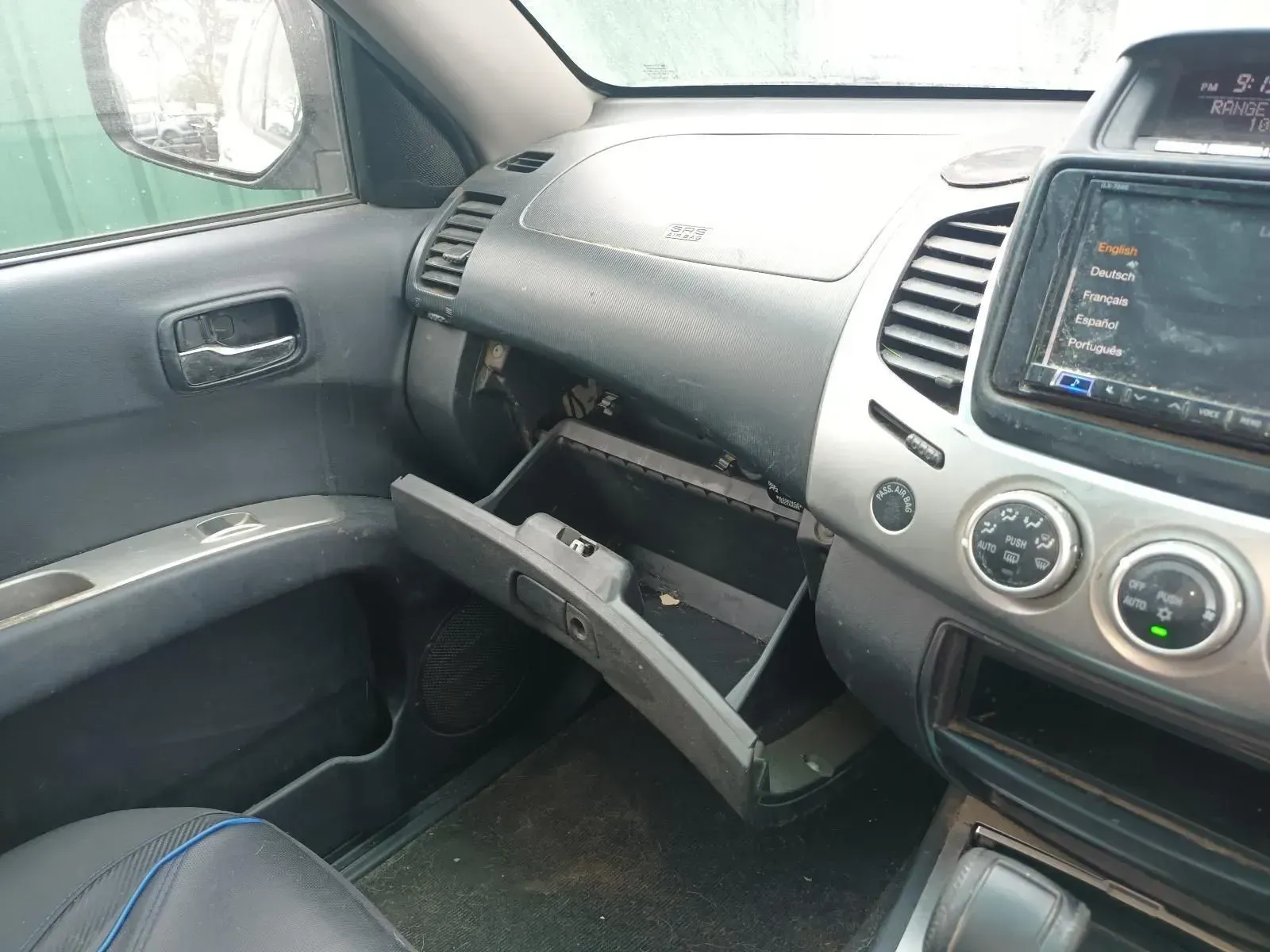 Interior of a Car With Open Glove Compartment — South West 4WD Wreckers In Harristown, QLD