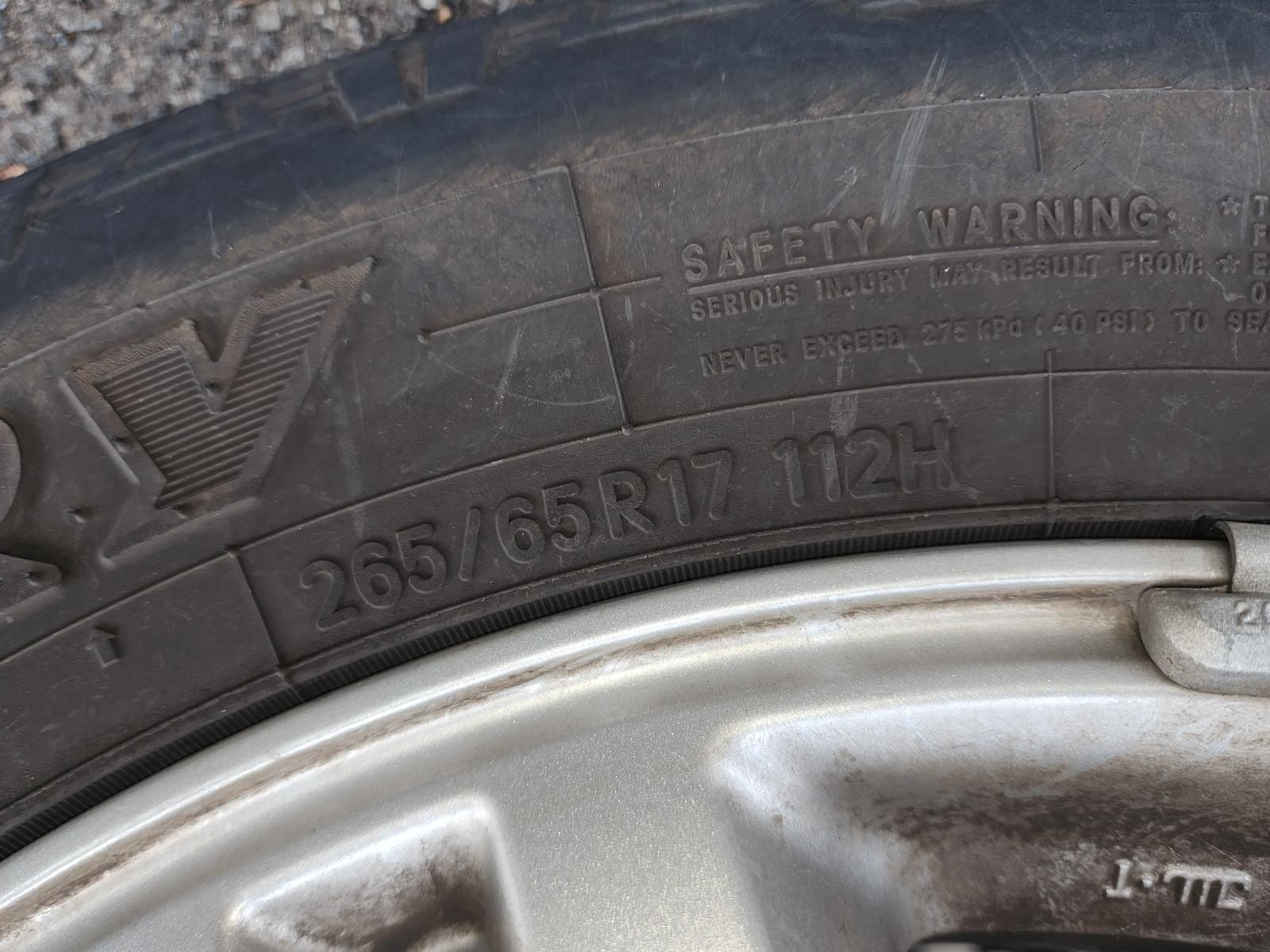 Close-up of a Car Tire Sidewall With Embossed Safety Warning — South West 4WD Wreckers In Harristown, QLD