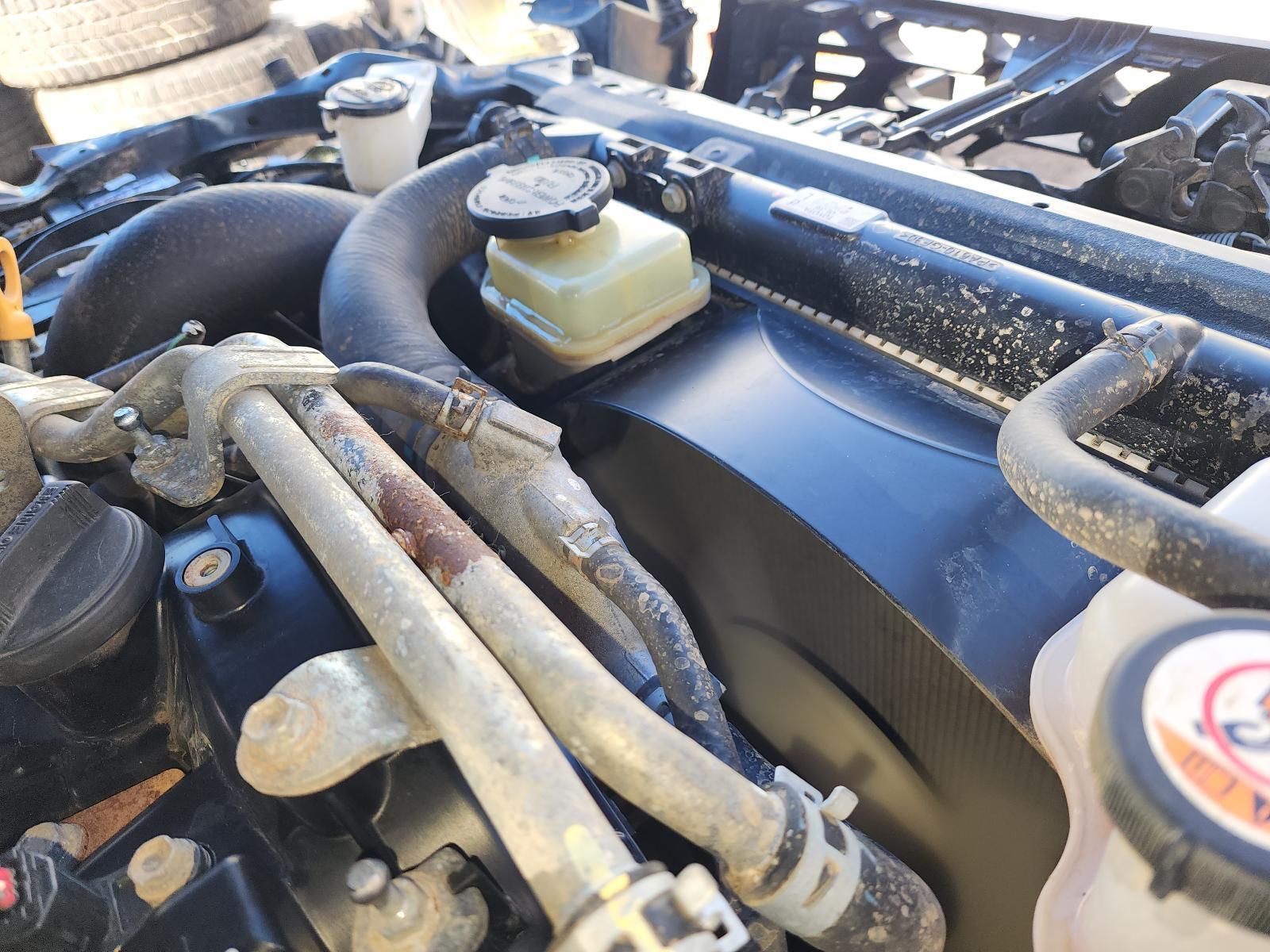 Close-up of a Dusty Car Engine Bay With Hoses — South West 4WD Wreckers In Harristown, QLD