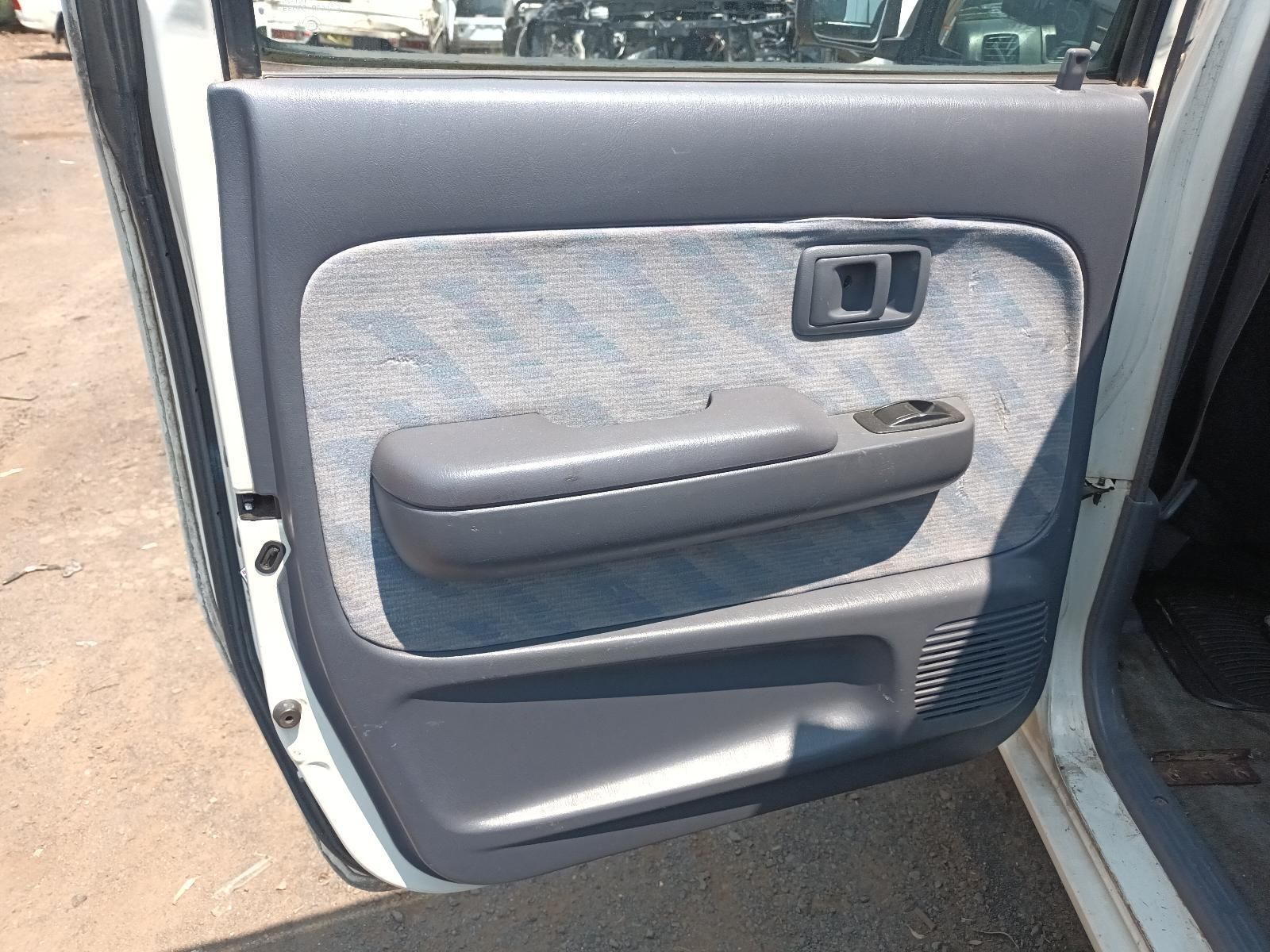 Car Door Interior with A Grey Fabric Panel — South West 4WD Wreckers In Harristown, QLD