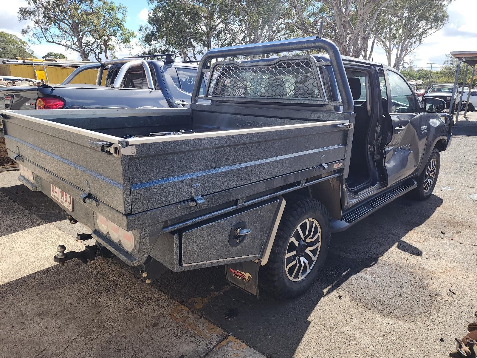 Damaged Silver Pickup Truck With an Open Door — South West 4WD Wreckers In Harristown, QLD