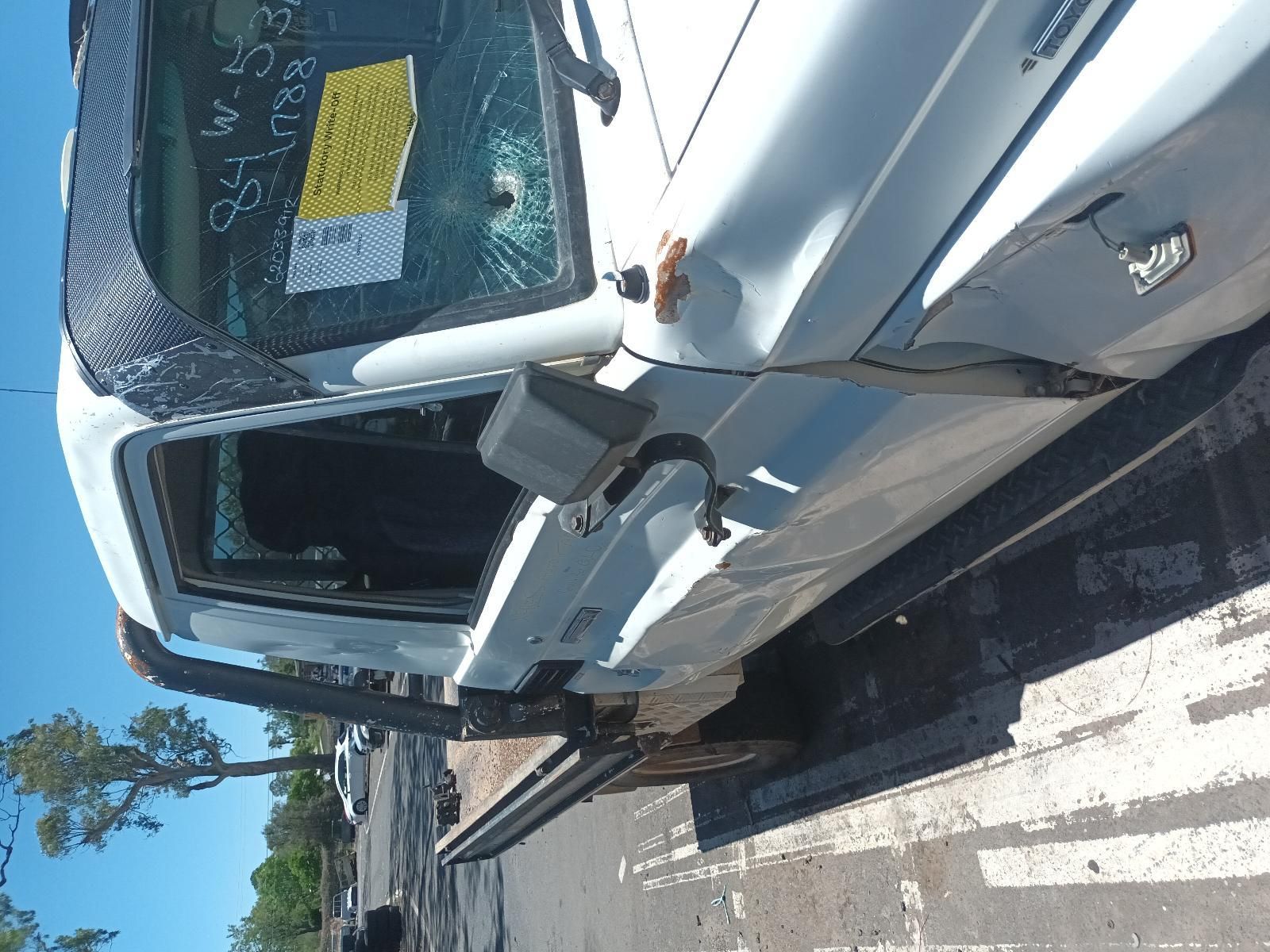 Damaged White Car with Shattered Windshield — South West 4WD Wreckers In Harristown, QLD