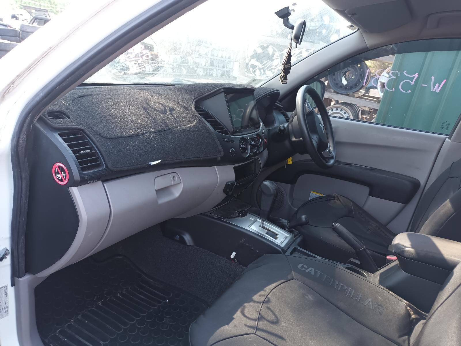 Car Interior with Front Passenger Door Open — South West 4WD Wreckers In Harristown, QLD