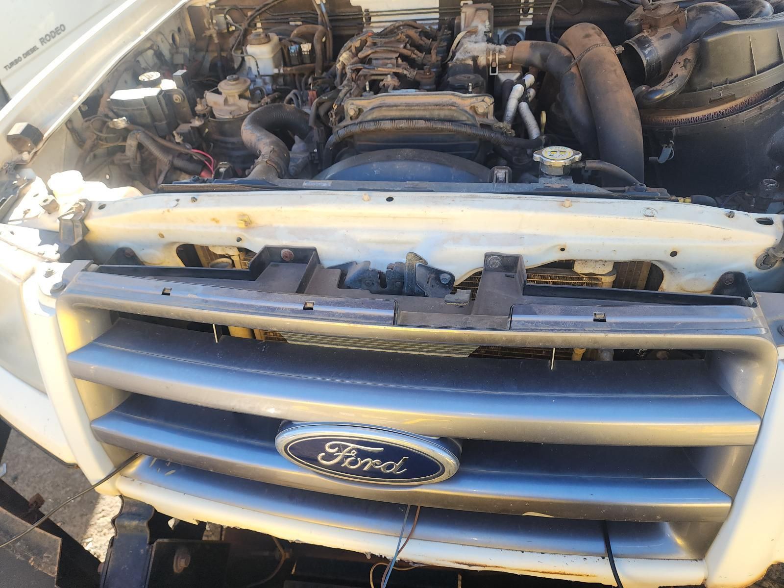 Ford Vehicle Front With Hood Open — South West 4WD Wreckers In Harristown, QLD