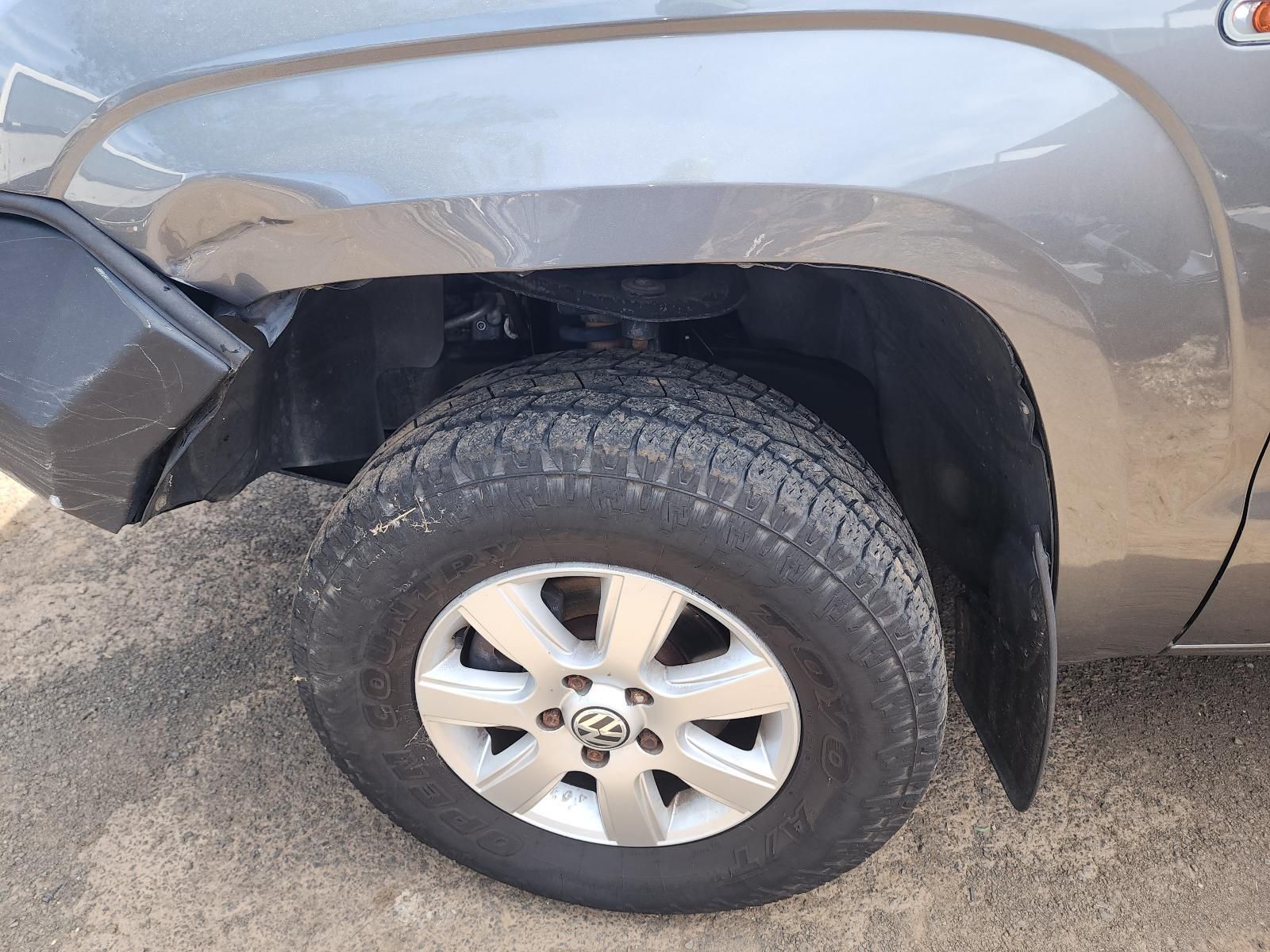 Front Wheel and Fender of a Silver SUV — South West 4WD Wreckers In Harristown, QLD