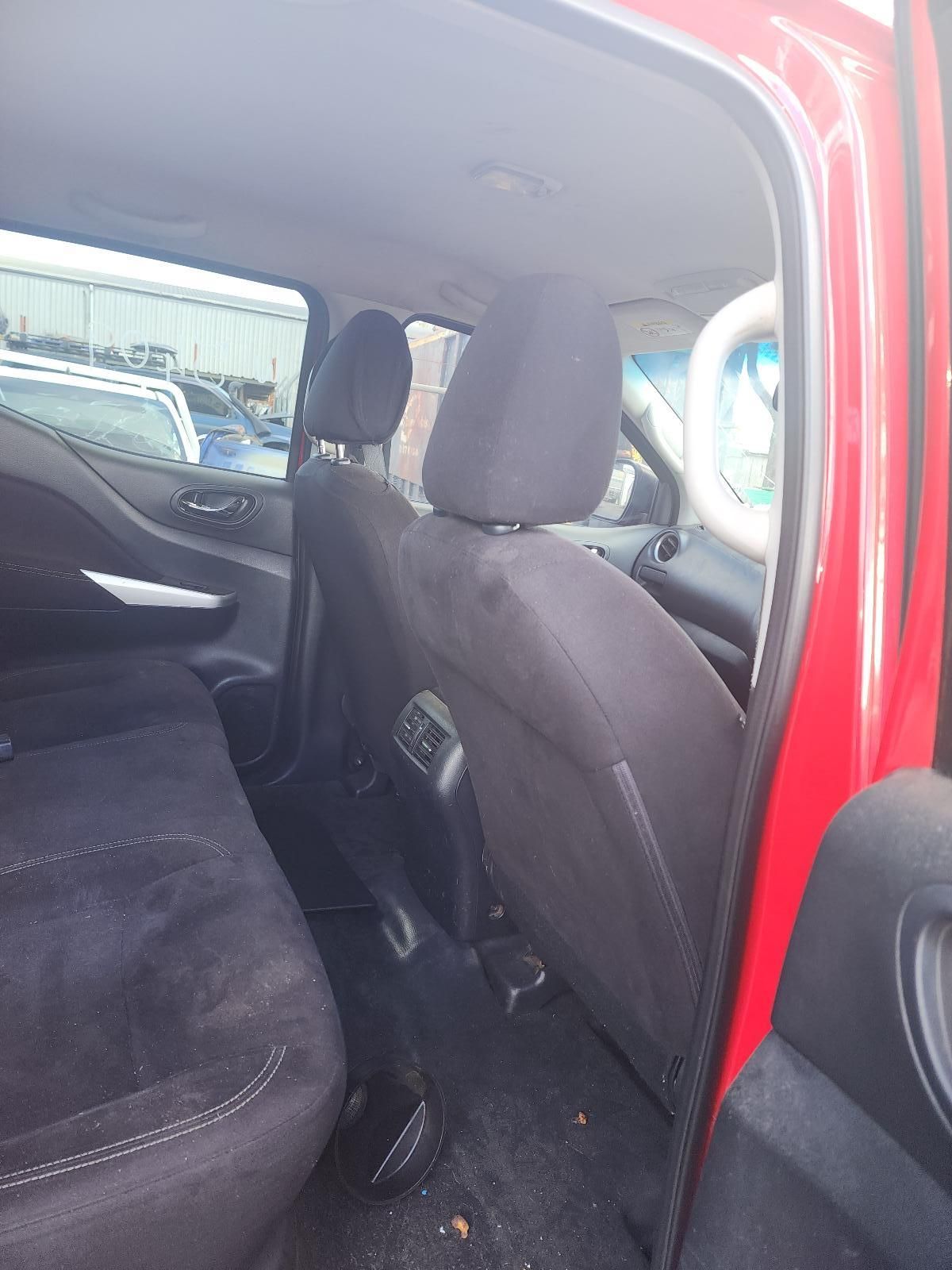 Interior of a Red Car, Showing the Front Seats — South West 4WD Wreckers In Harristown, QLD