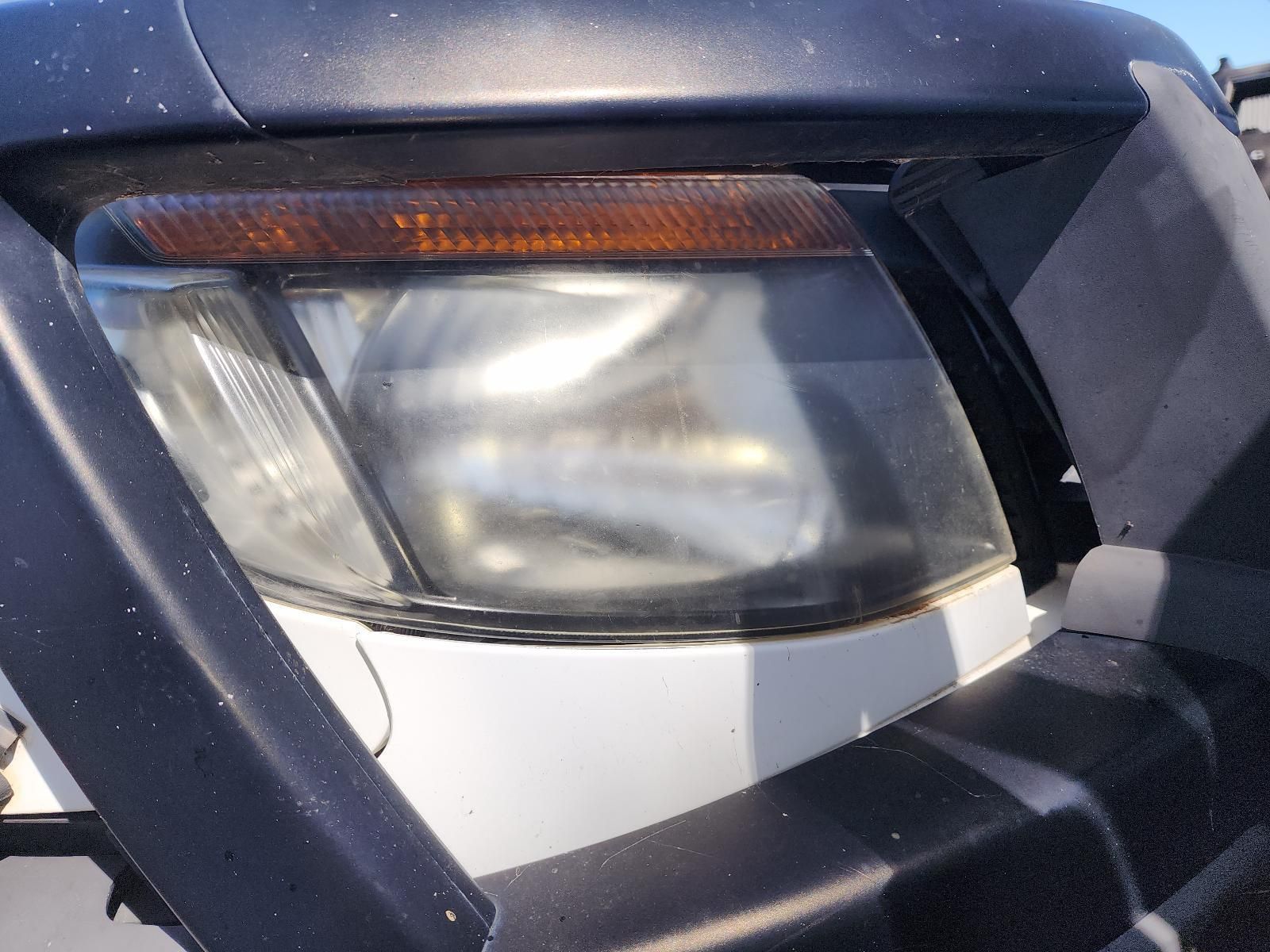Close-up of a Car’s Front Headlight — South West 4WD Wreckers In Harristown, QLD
