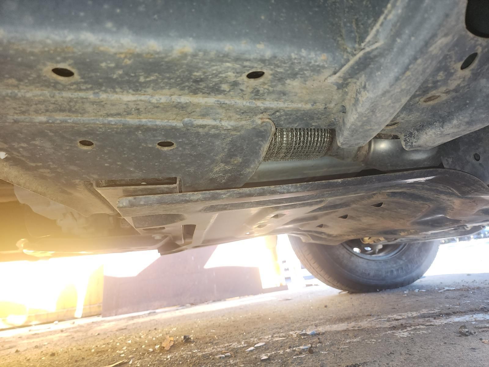 Undercarriage of a Dusty Vehicle Showing — South West 4WD Wreckers In Harristown, QLD